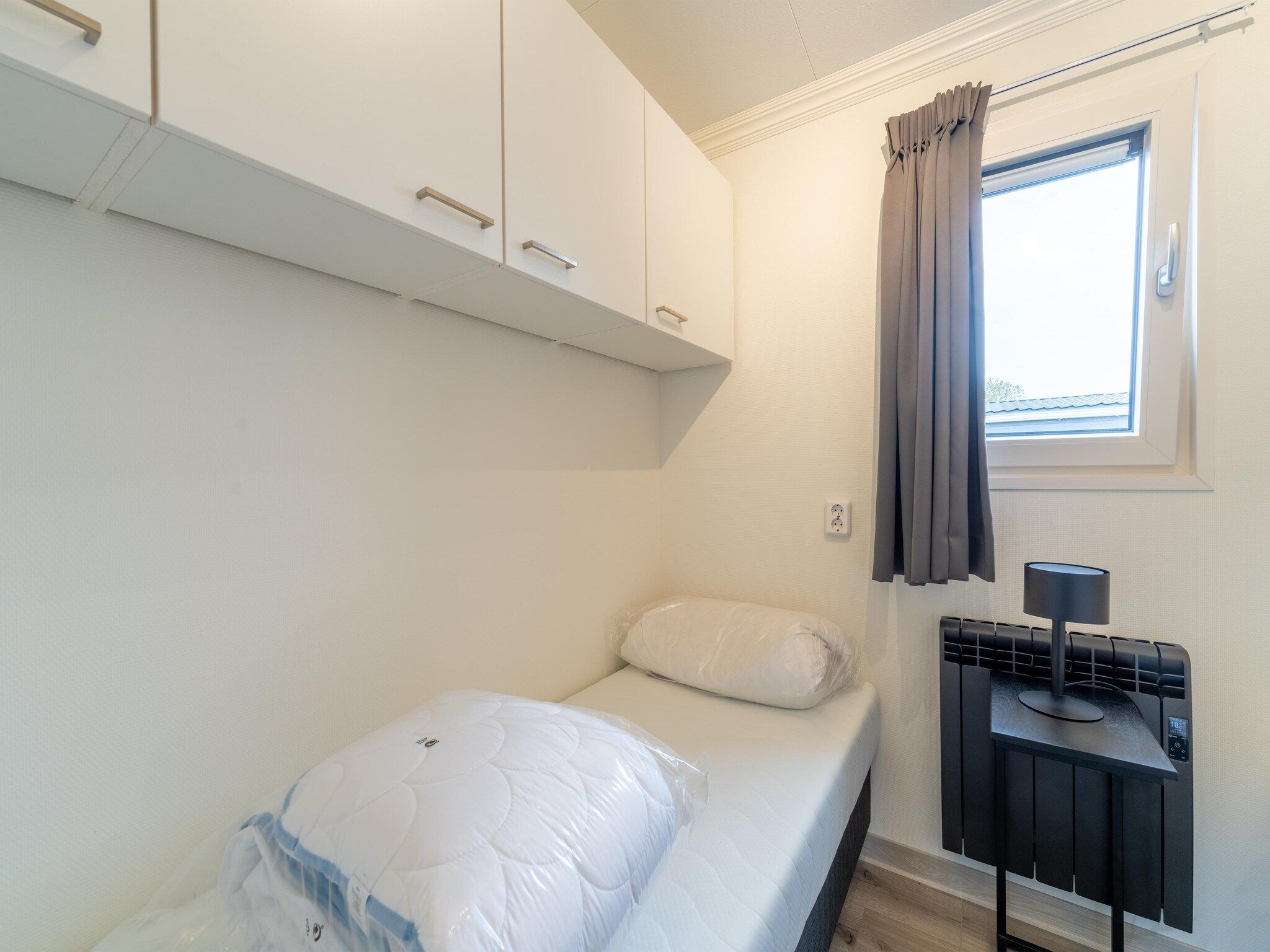 Een slaapkamer van Brabants Weelde 33 in Molenschot