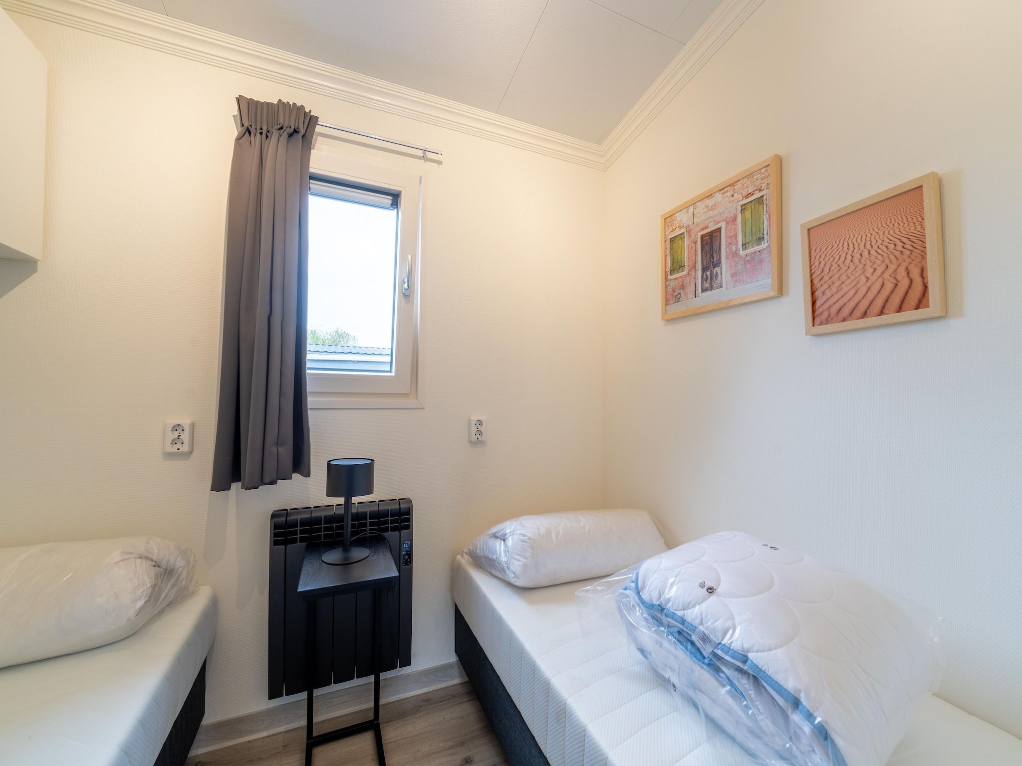 Een slaapkamer van Brabants Weelde 33 in Molenschot