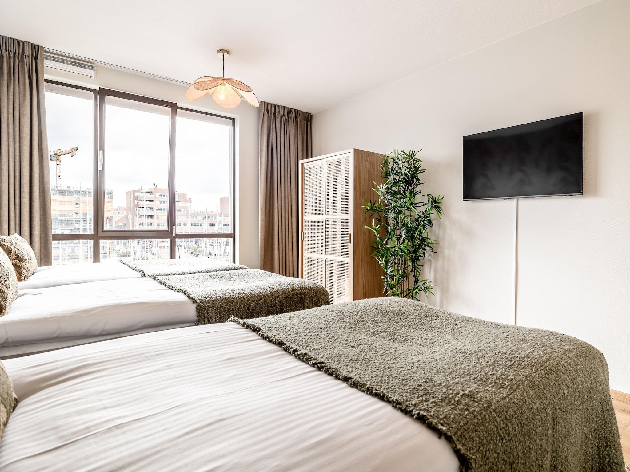 Een slaapkamer van Scheveningen Harbour 36C in Scheveningen