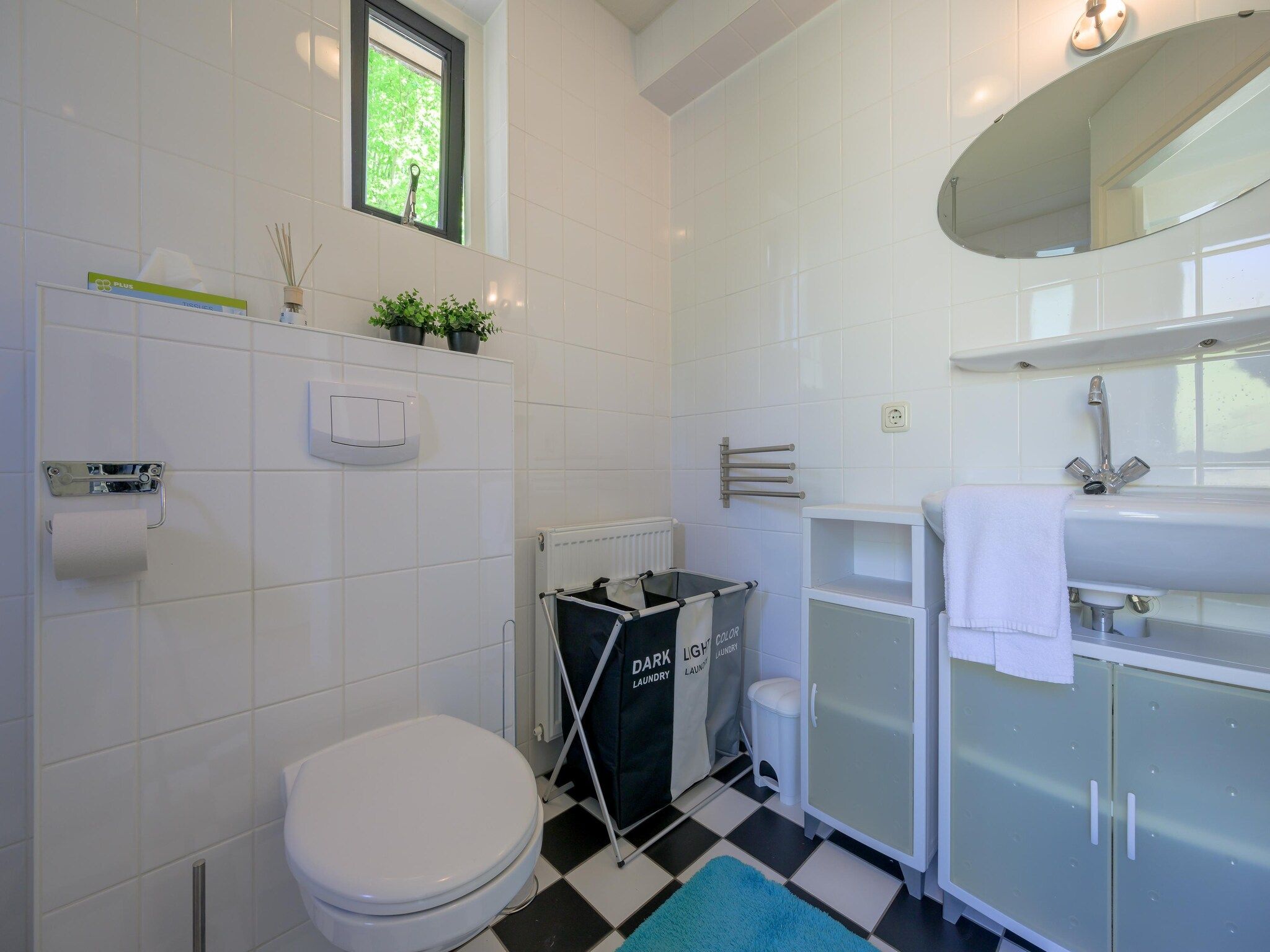 De badkamer van 6-persoons bungalow 27 in Sondel