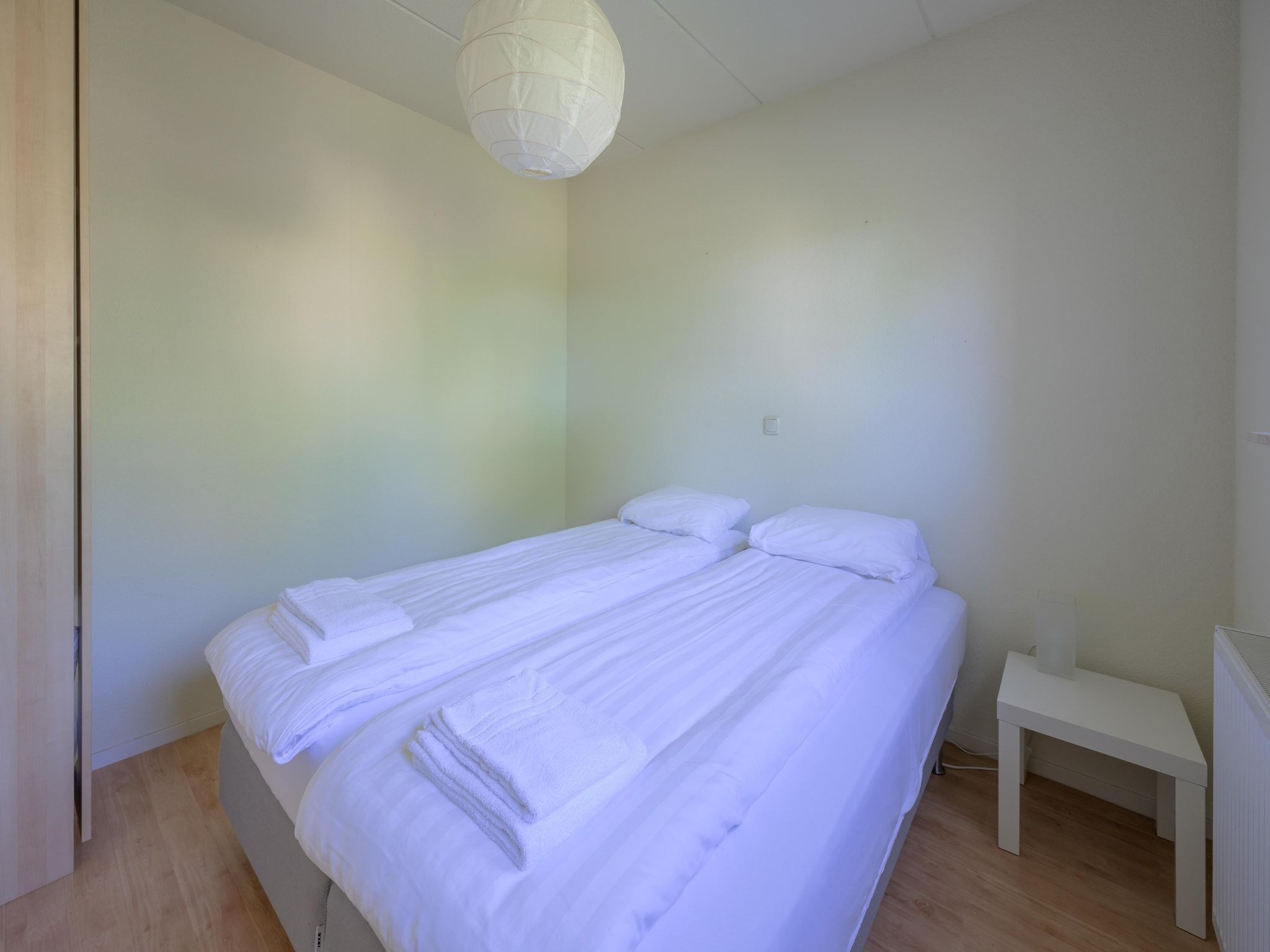 Een slaapkamer van 6-persoons bungalow 27 in Sondel