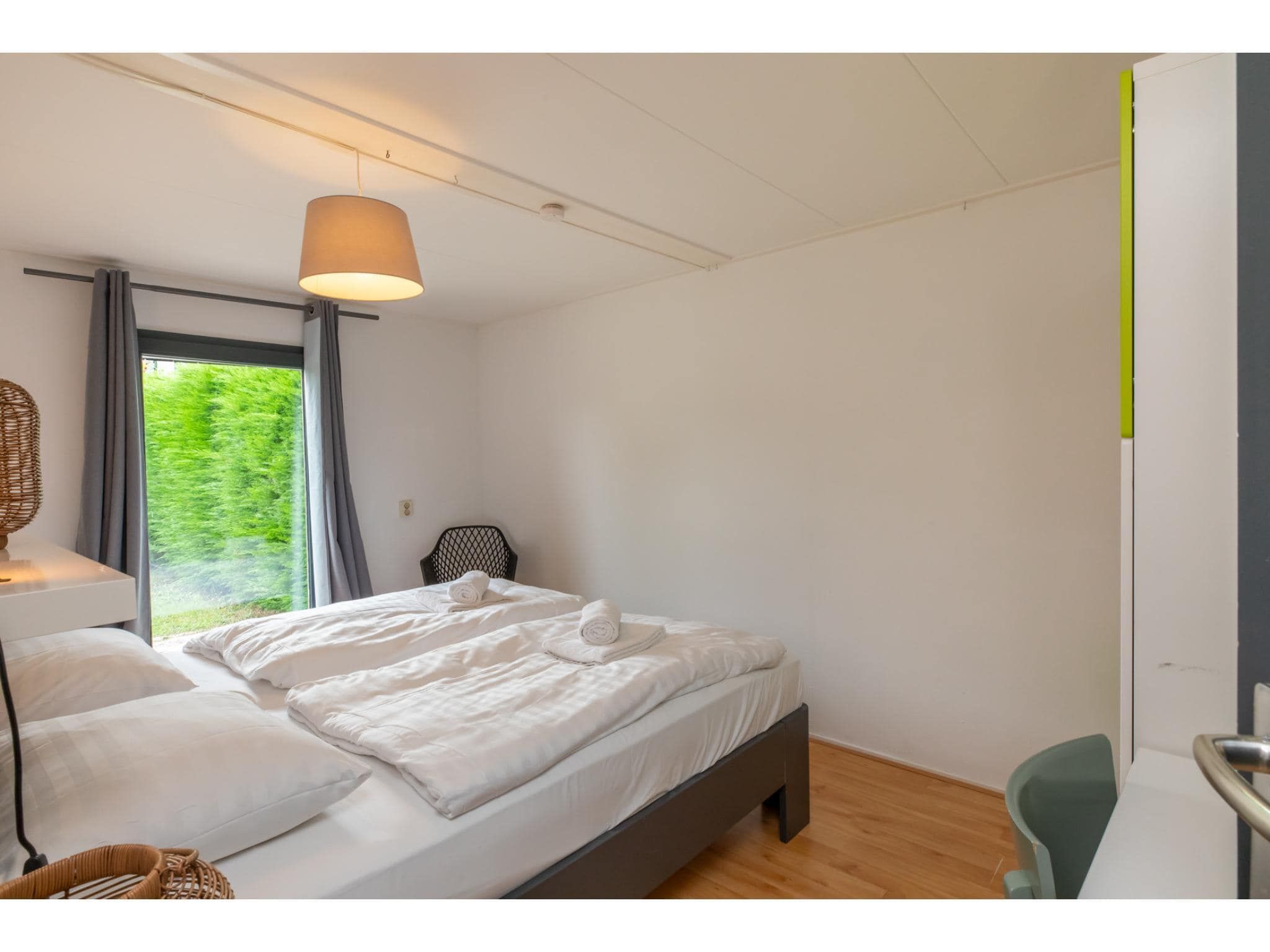 Een slaapkamer van Strandhuis Schoneveld in Breskens