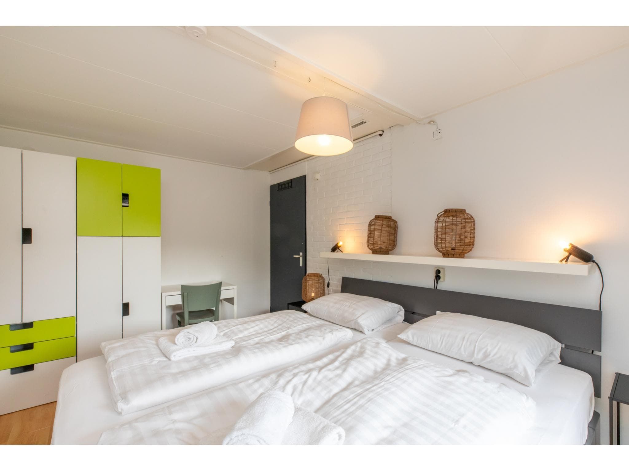 Een slaapkamer van Strandhuis Schoneveld in Breskens