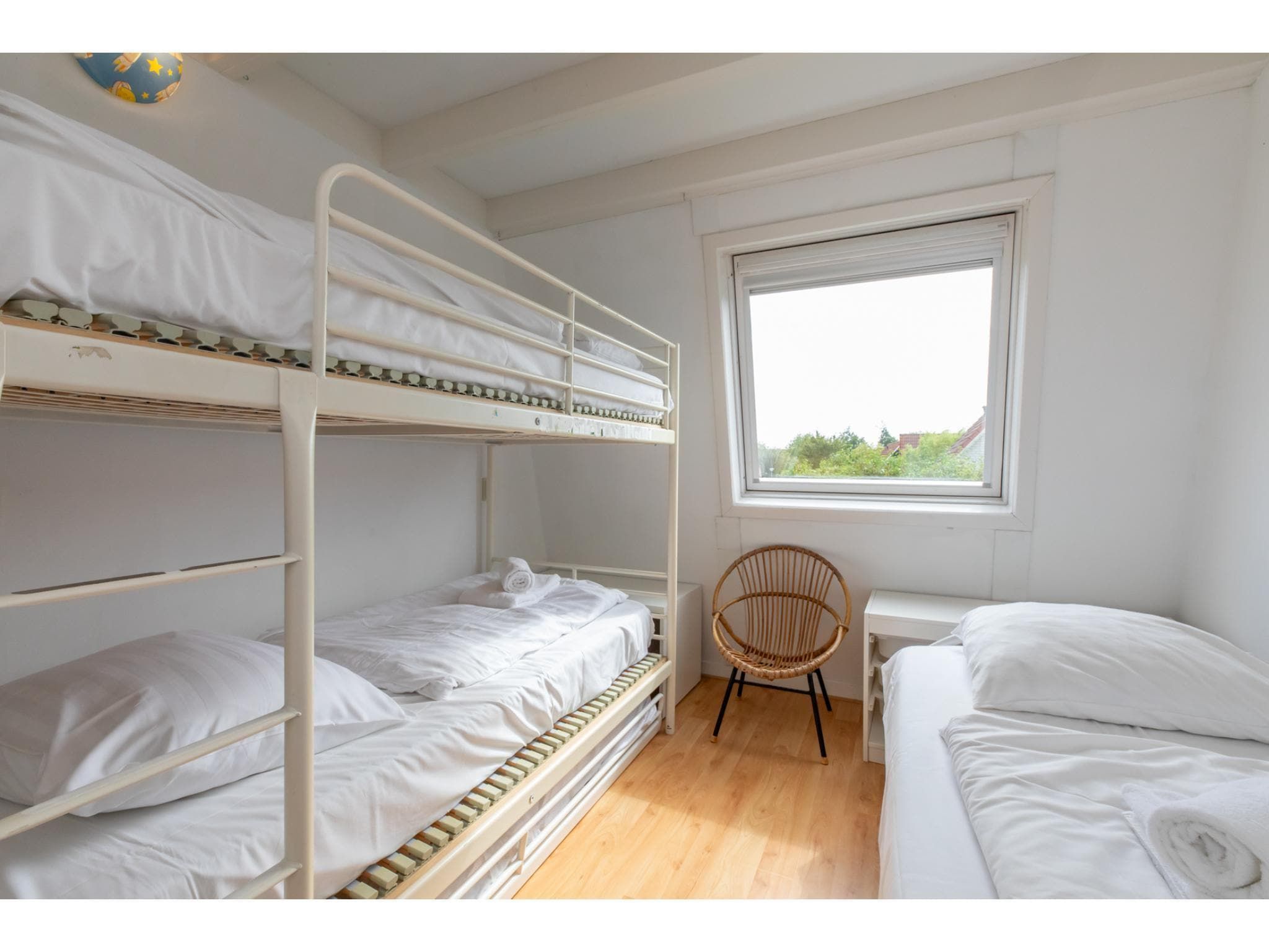 Een slaapkamer van Strandhuis Schoneveld in Breskens