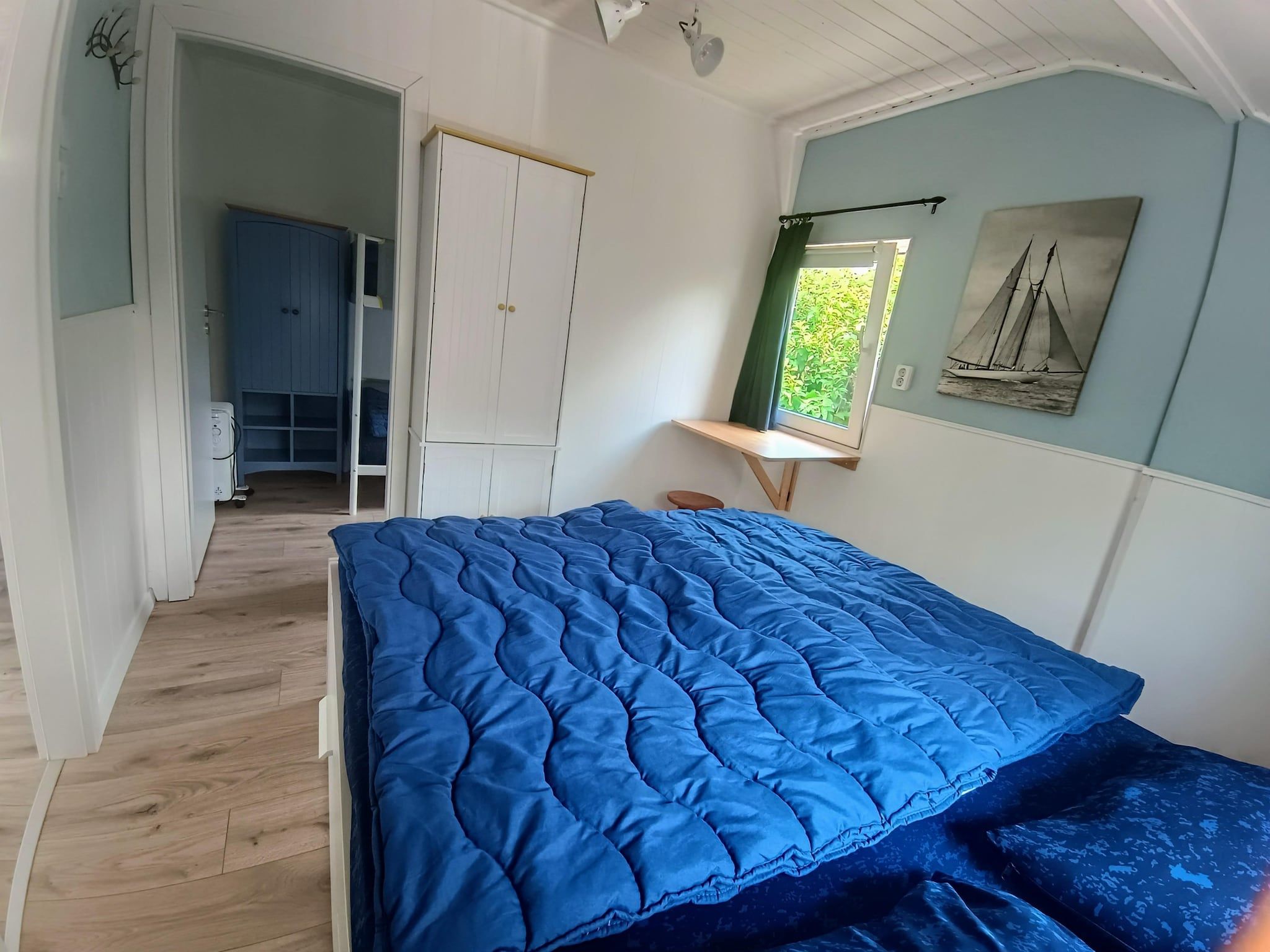 Een slaapkamer van Cosy Hideout in Dirkshorn