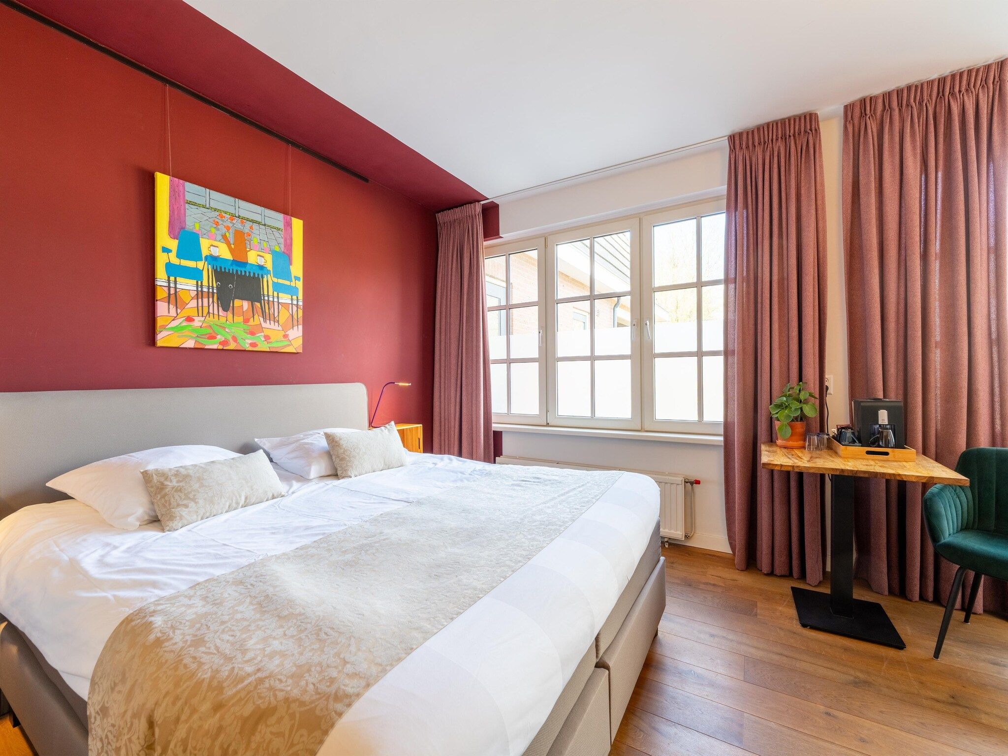 Een slaapkamer van Landhuis Hezenes in Diever