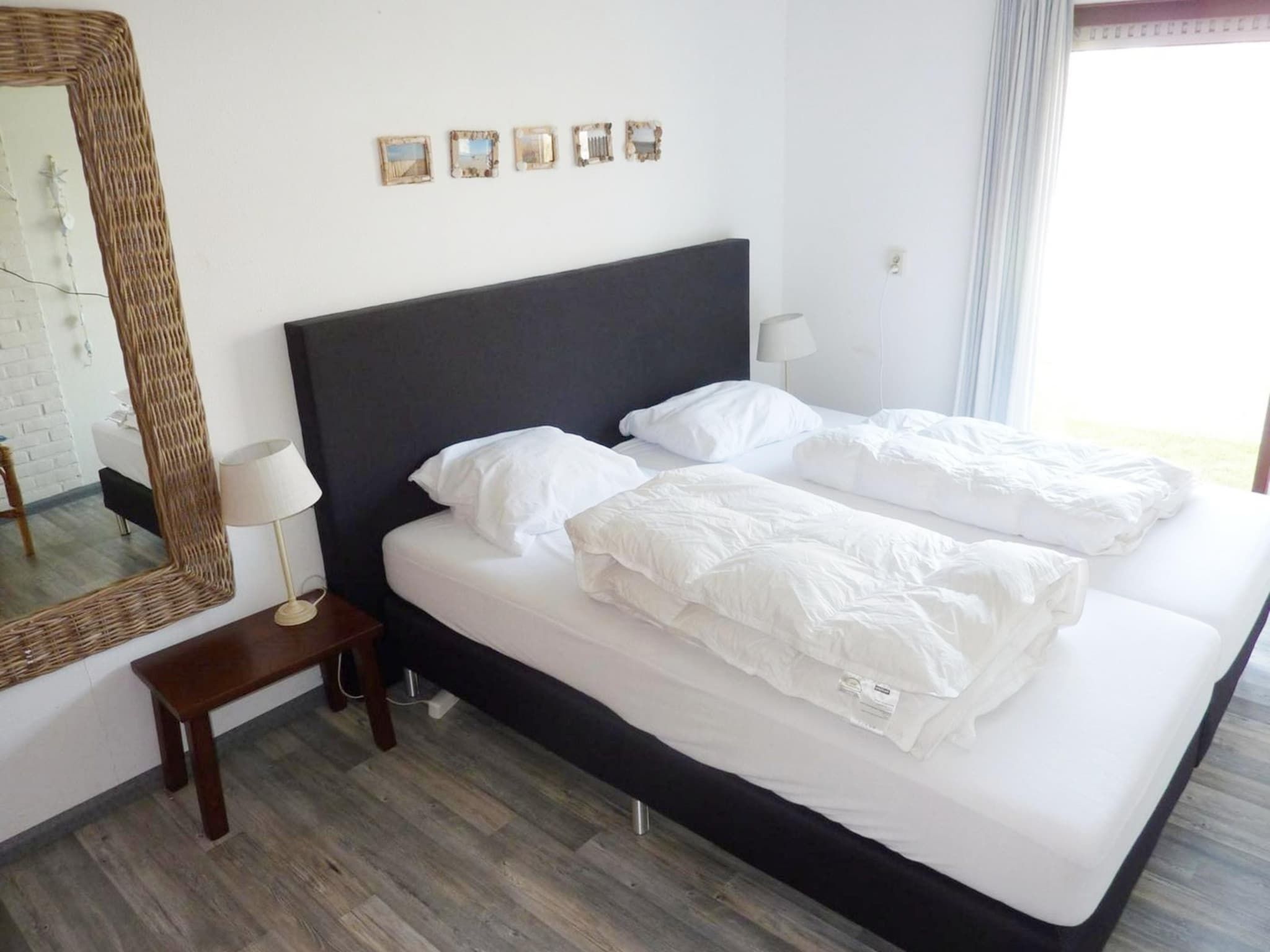 Een slaapkamer van Schoneveld 11 Zeester Breskens in Breskens