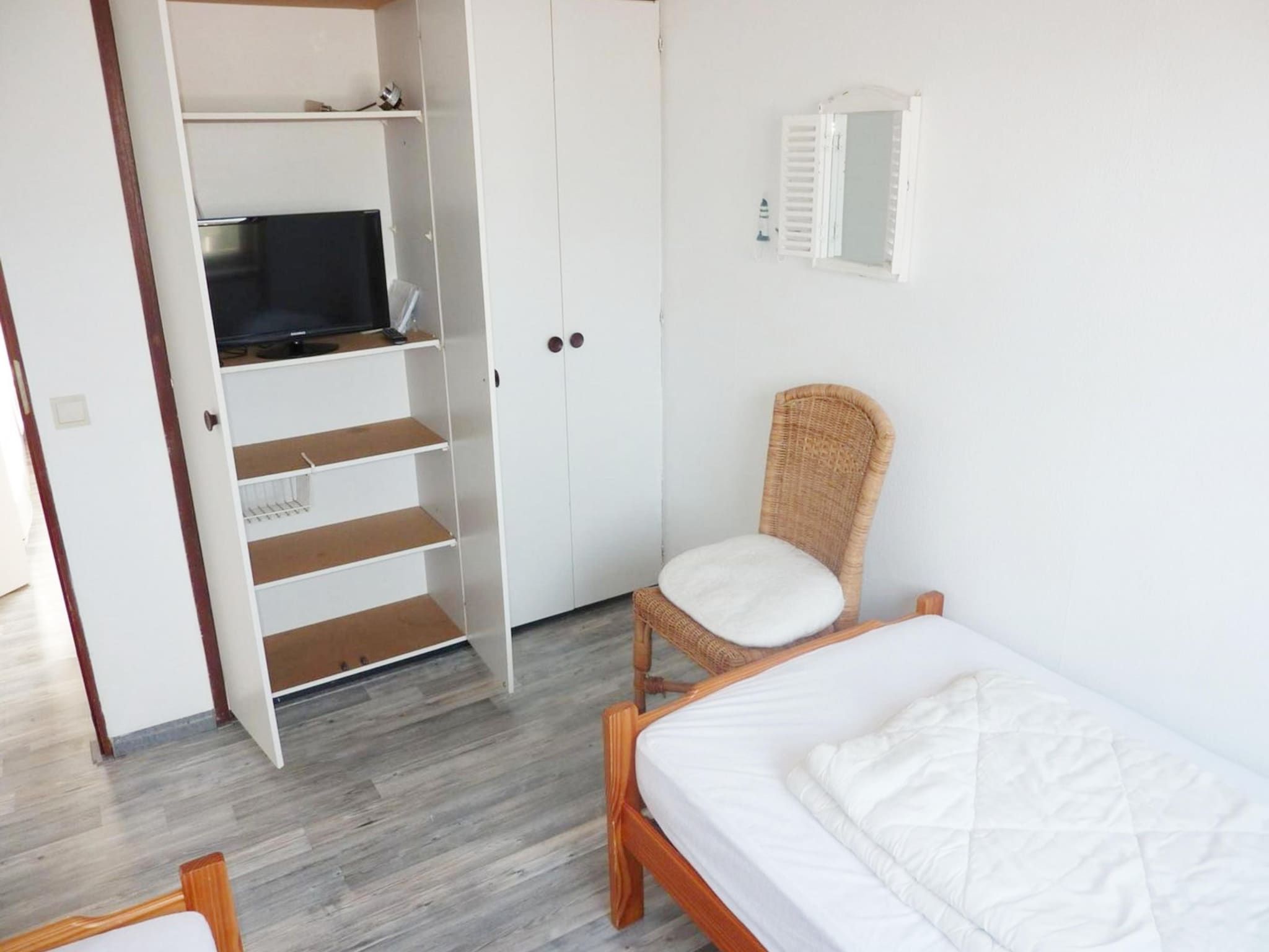 Een slaapkamer van Schoneveld 11 Zeester Breskens in Breskens