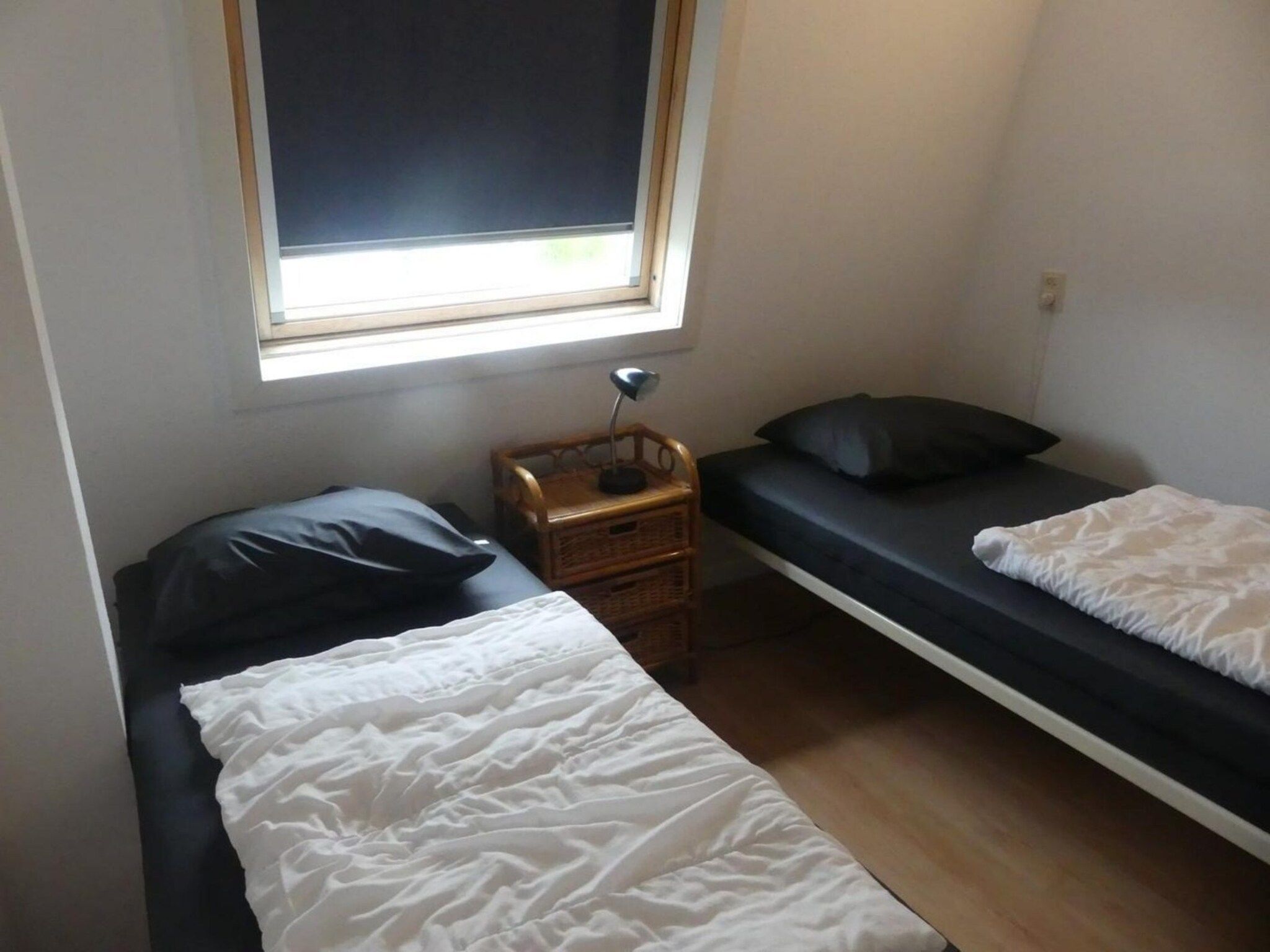 Een slaapkamer van Schoneveld 32 Zeester Breskens in Breskens