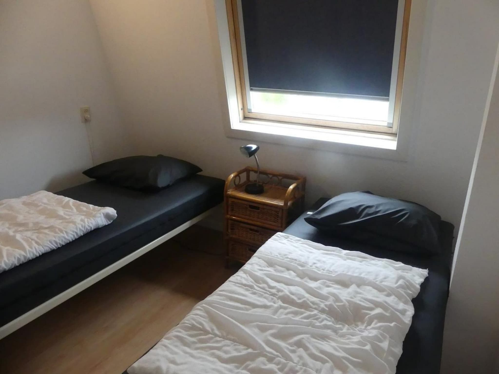 Een slaapkamer van Schoneveld 32 Zeester Breskens in Breskens