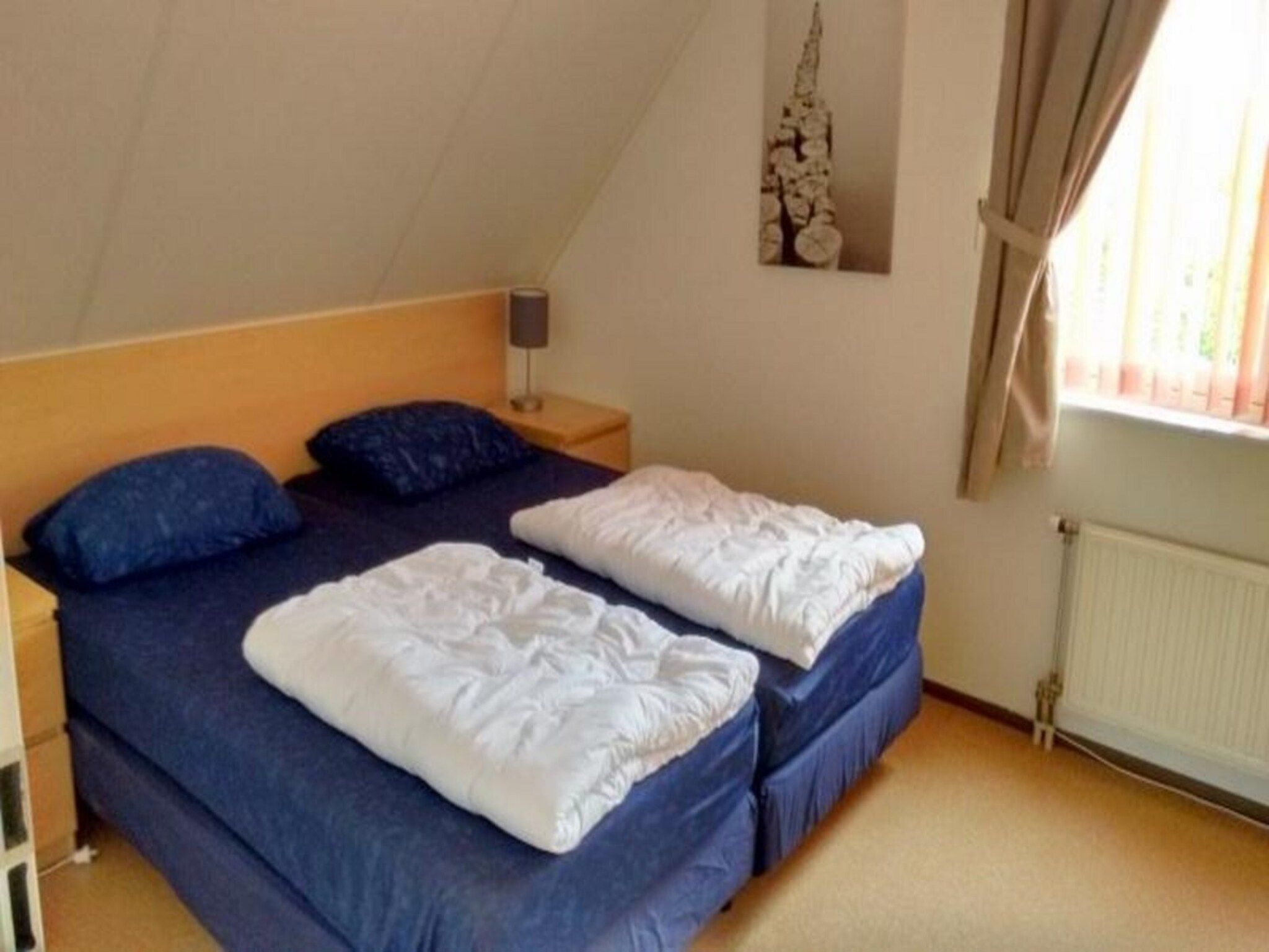 Een slaapkamer van Scheldeveste 153 Zwin Breskens in Breskens