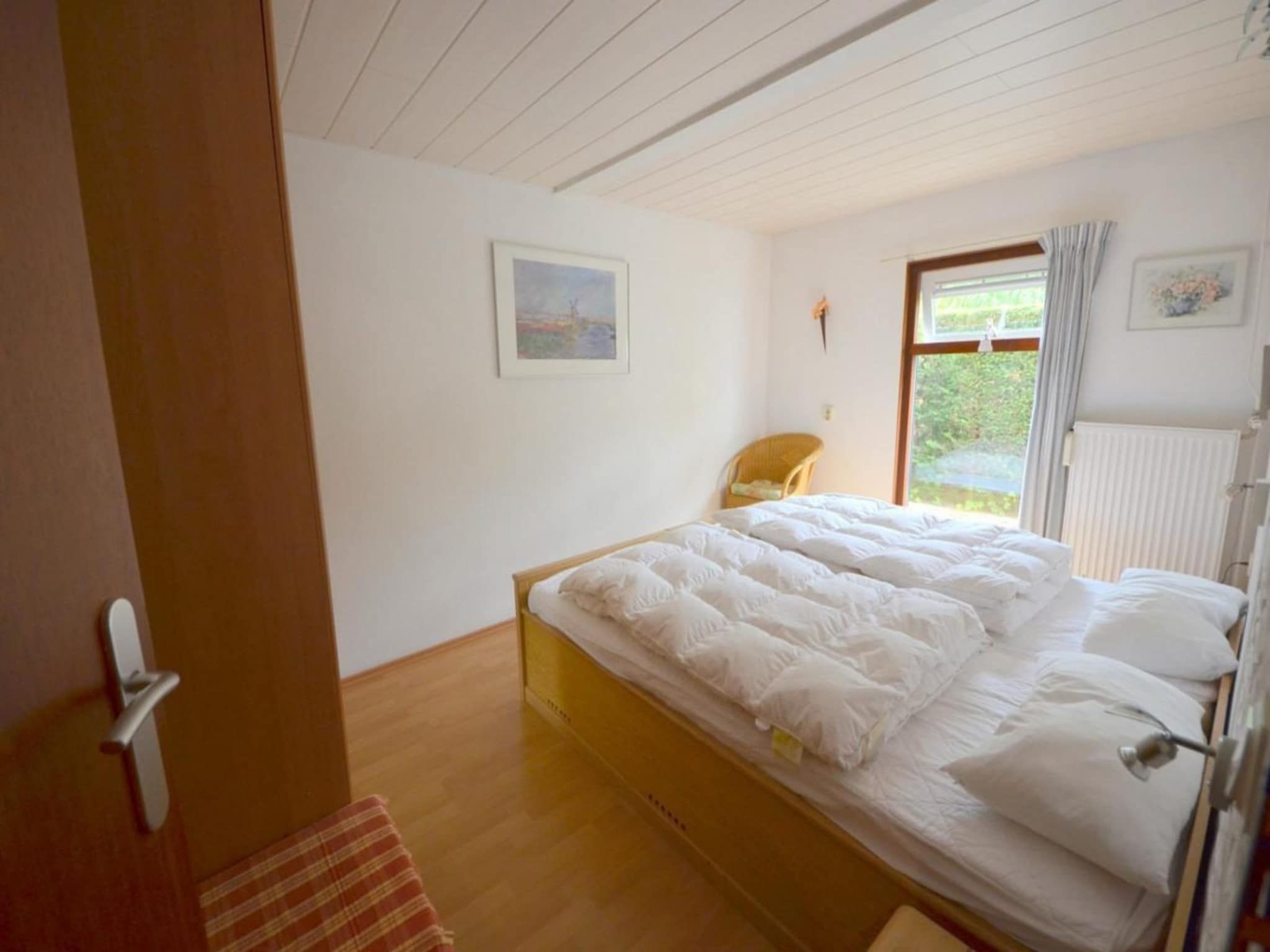 Een slaapkamer van Schoneveld 35 Zeester Breskens in Breskens