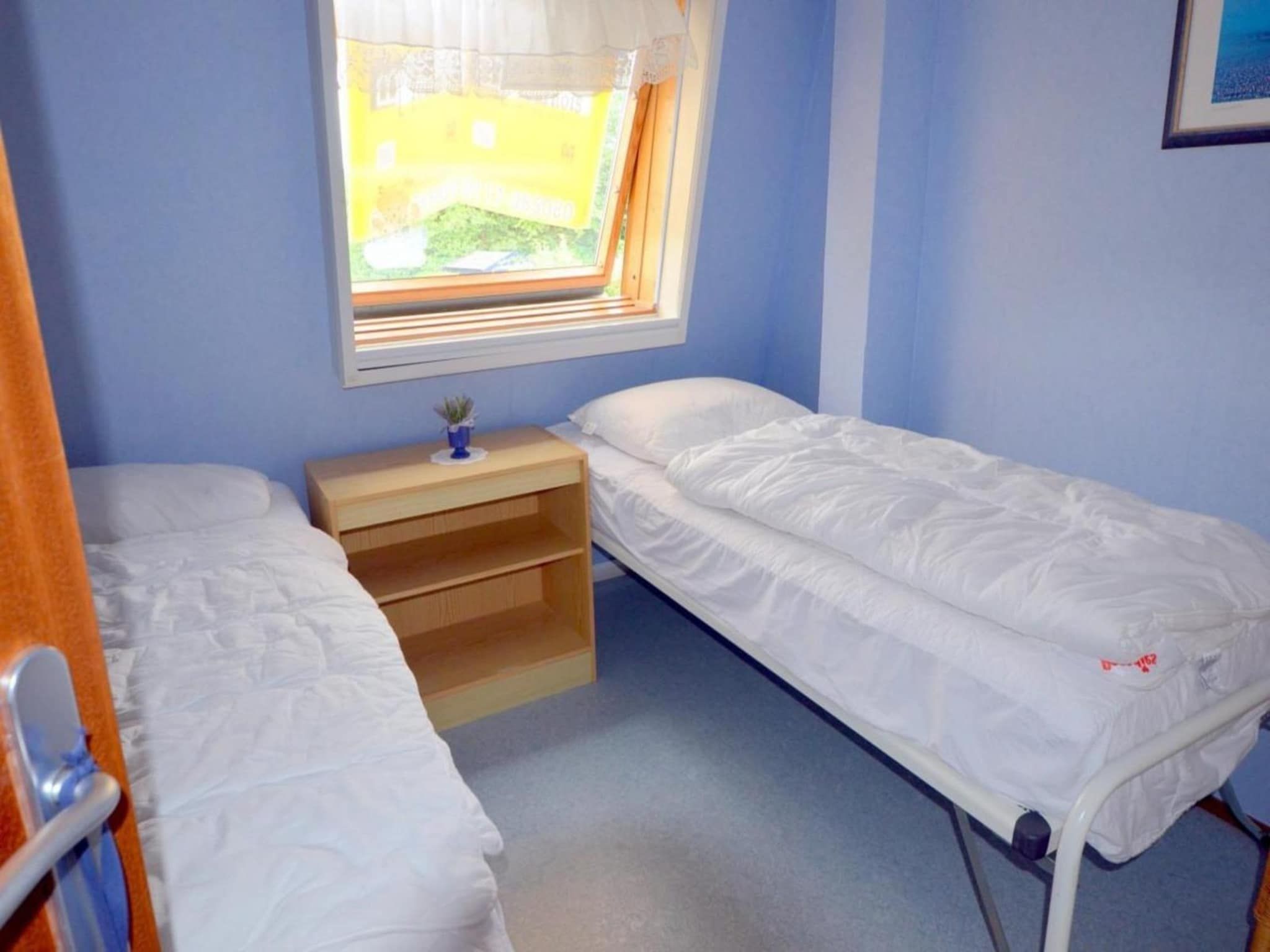 Een slaapkamer van Schoneveld 35 Zeester Breskens in Breskens