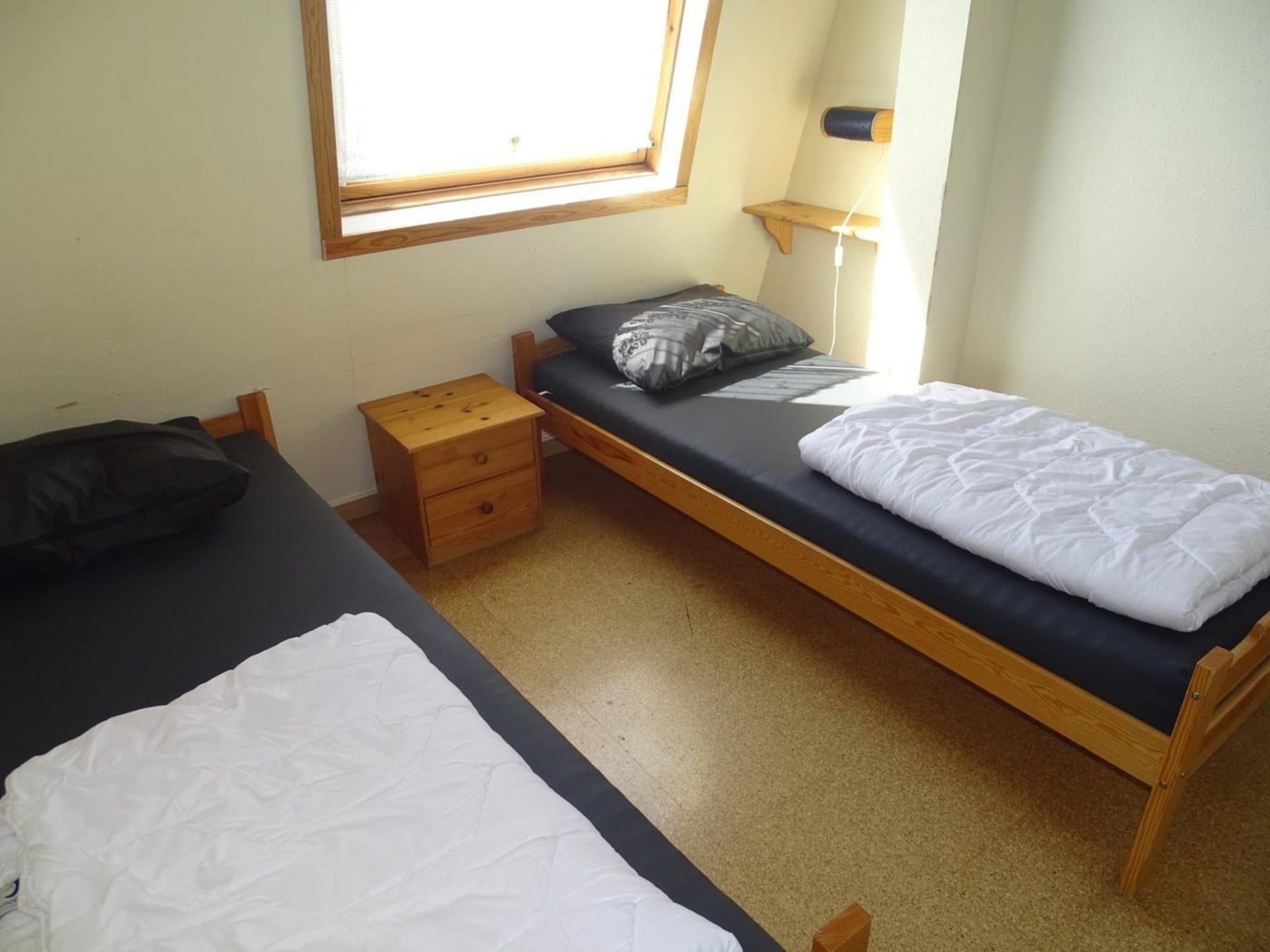 Een slaapkamer van Schoneveld 36 Zeester Breskens in Breskens