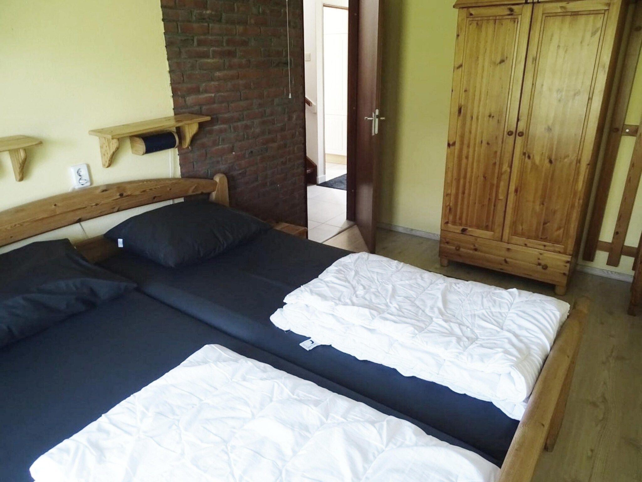 Een slaapkamer van Schoneveld 36 Zeester Breskens in Breskens