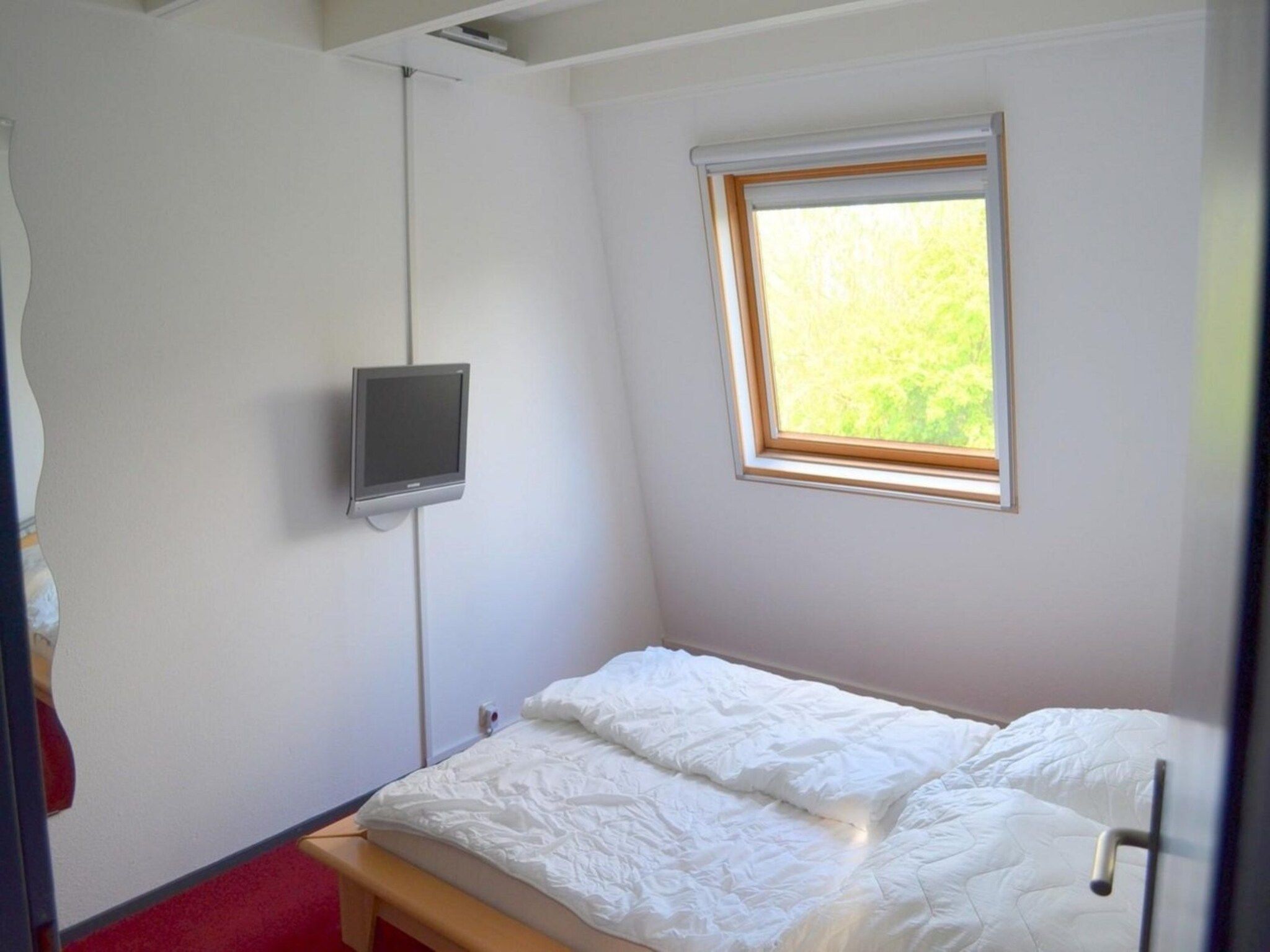 Een slaapkamer van Schoneveld 39 Zeester Breskens in Breskens