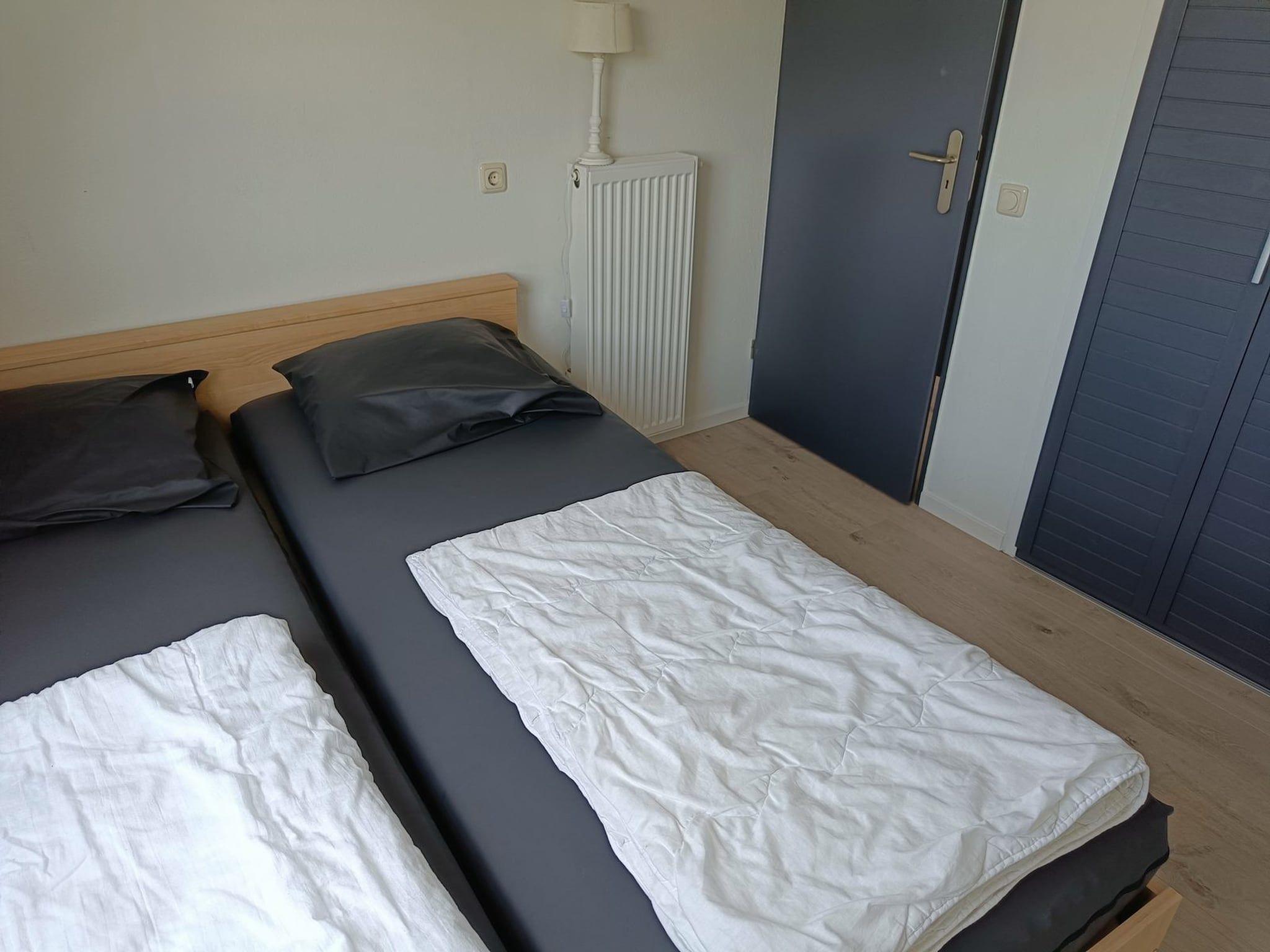 Een slaapkamer van Schoneveld 39 Zeester Breskens in Breskens