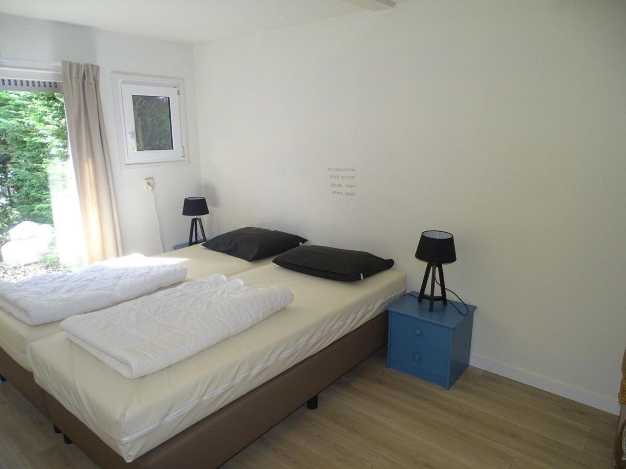 Een slaapkamer van Schoneveld 40 Zeester Breskens in Breskens