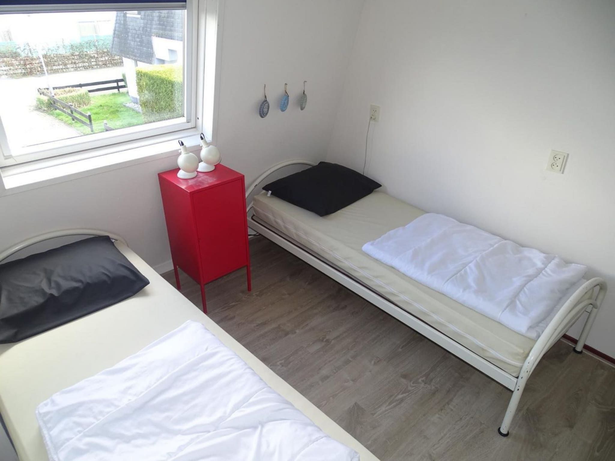 Een slaapkamer van Schoneveld 40 Zeester Breskens in Breskens