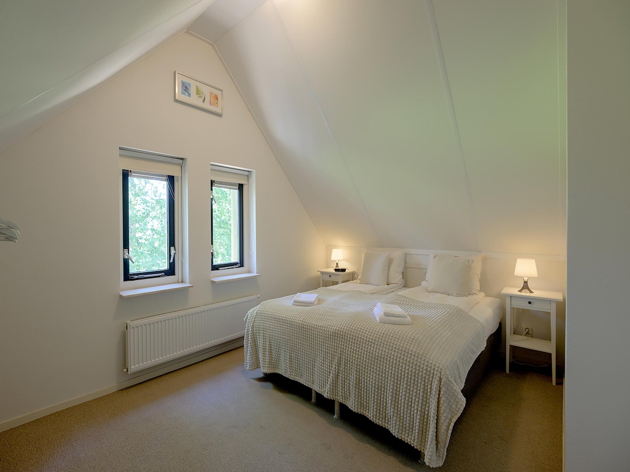 Een slaapkamer van 6-persoons bungalow 4 in Sondel