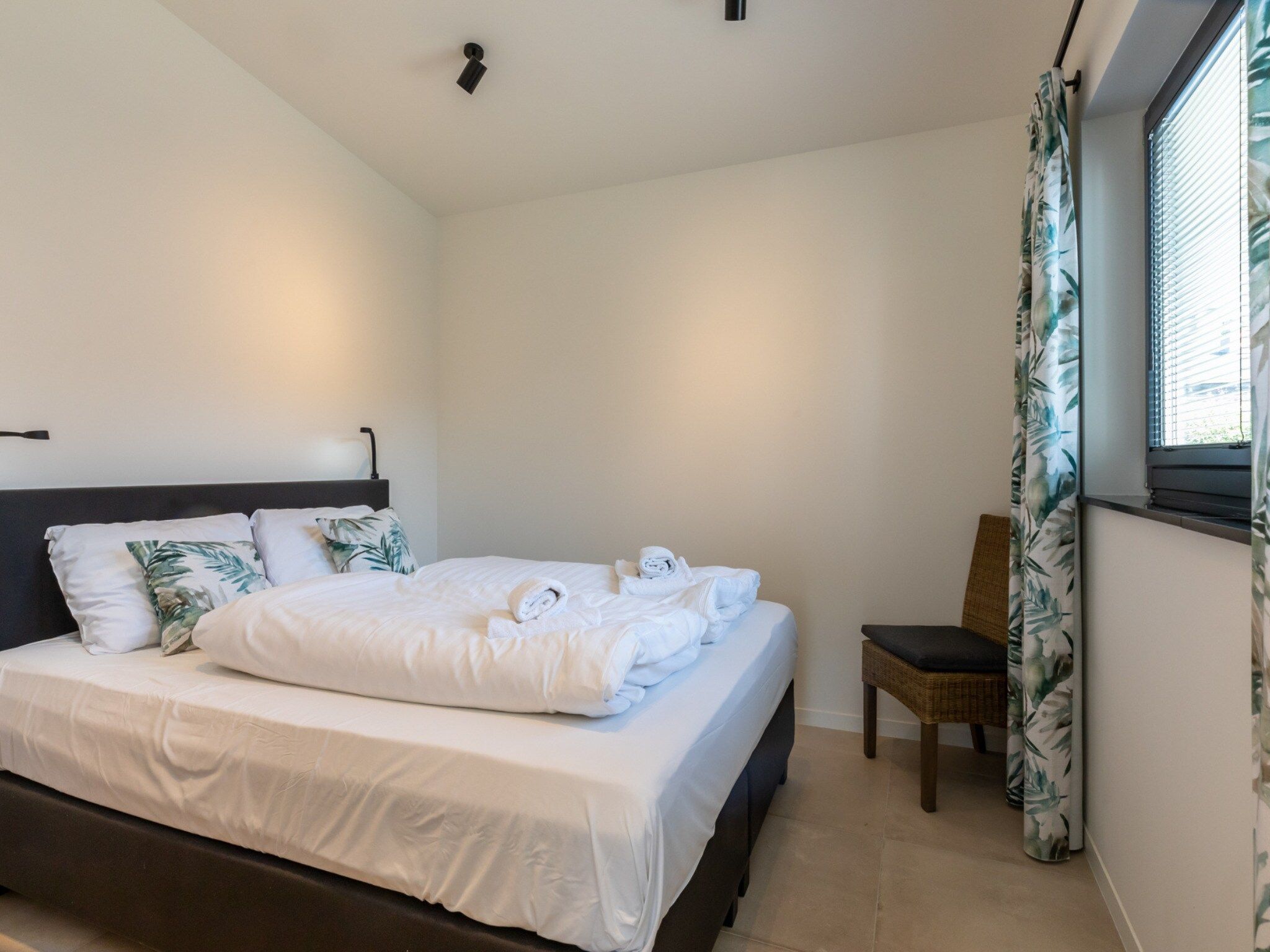 Een slaapkamer van Lepelblad 42 en 44  Nieuwvliet-Bad in Nieuwvliet-Bad