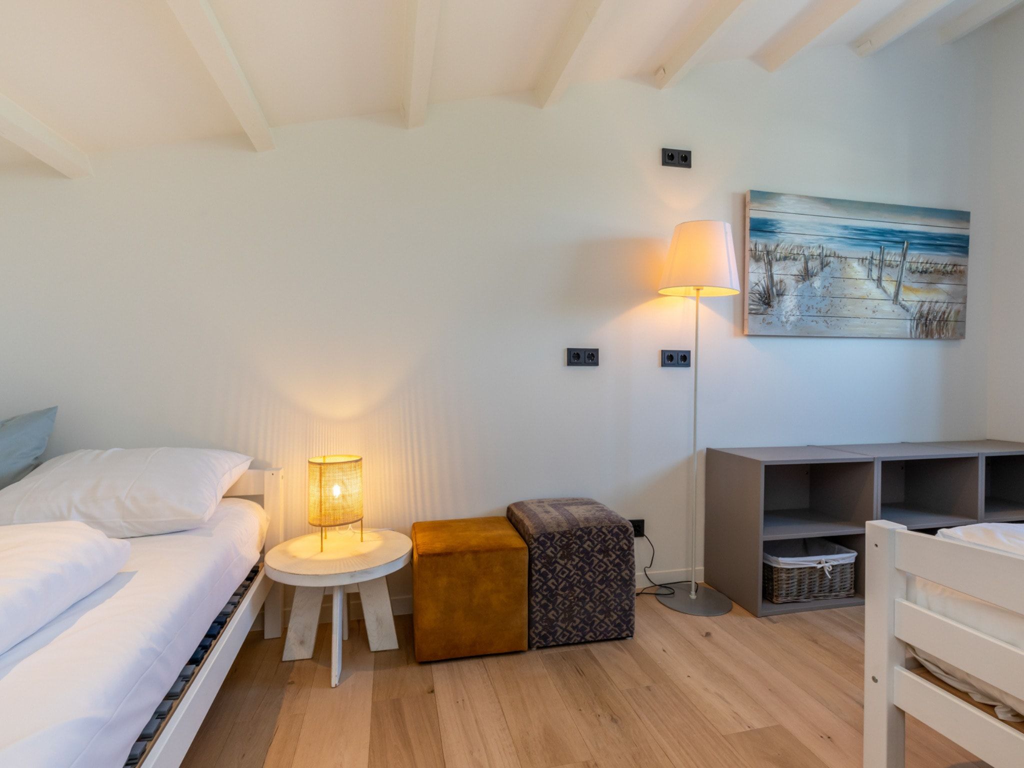 Een slaapkamer van Lepelblad 42 en 44  Nieuwvliet-Bad in Nieuwvliet-Bad