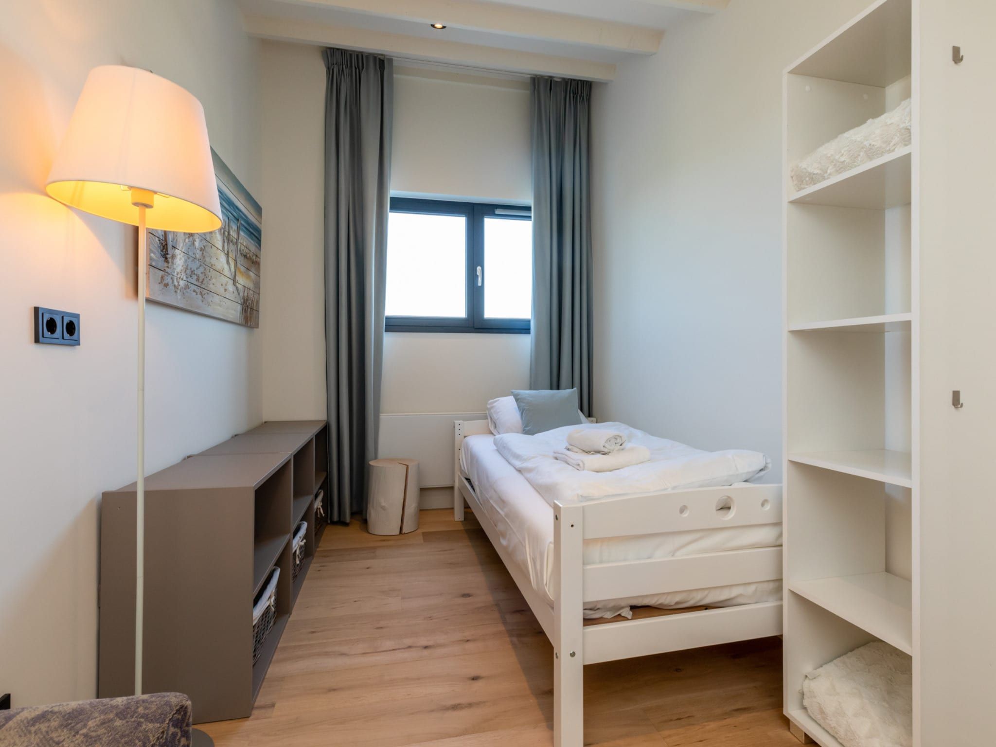 Een slaapkamer van Lepelblad 42 en 44  Nieuwvliet-Bad in Nieuwvliet-Bad