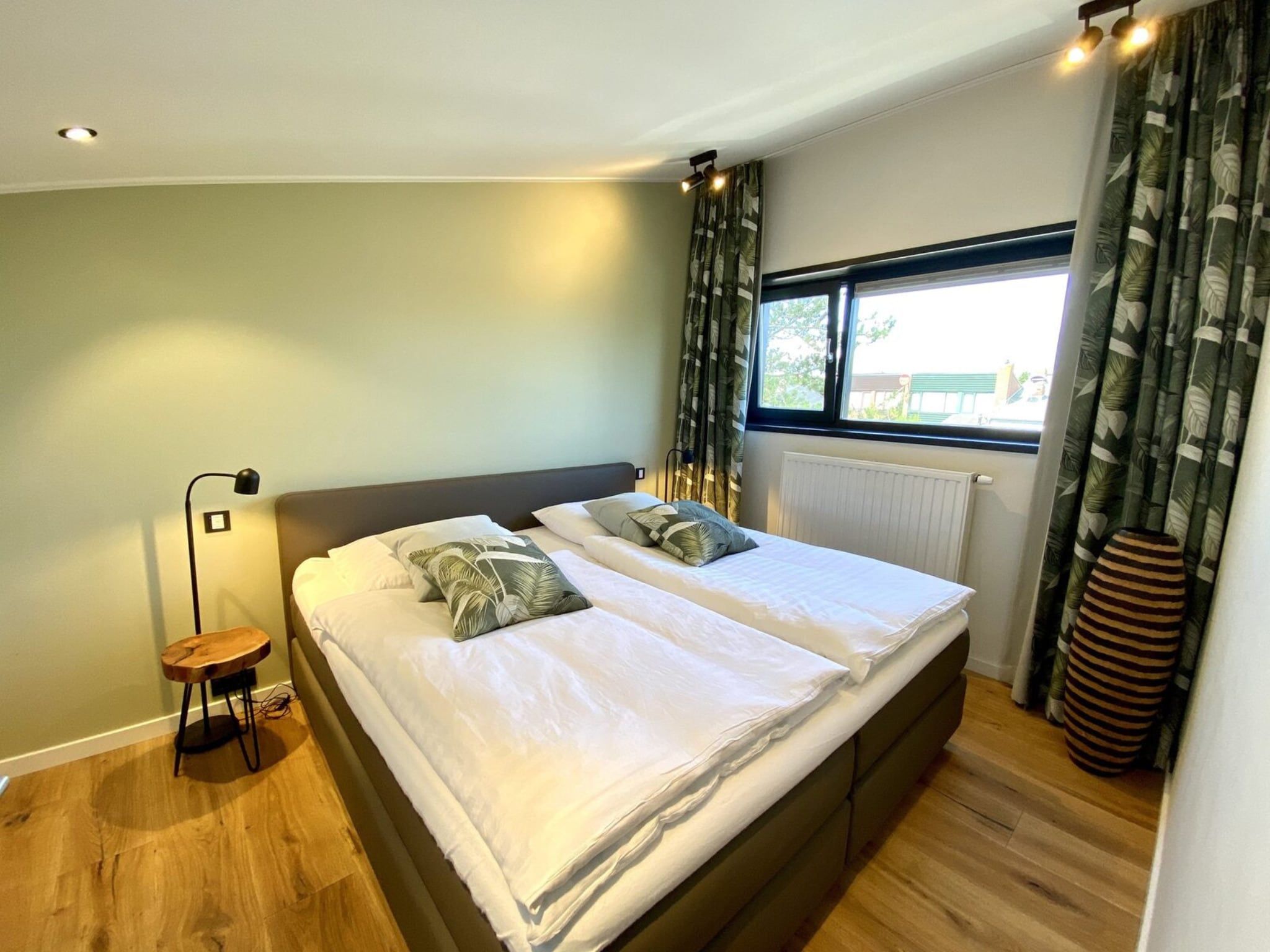 Een slaapkamer van Lepelblad 42 en 44  Nieuwvliet-Bad in Nieuwvliet-Bad