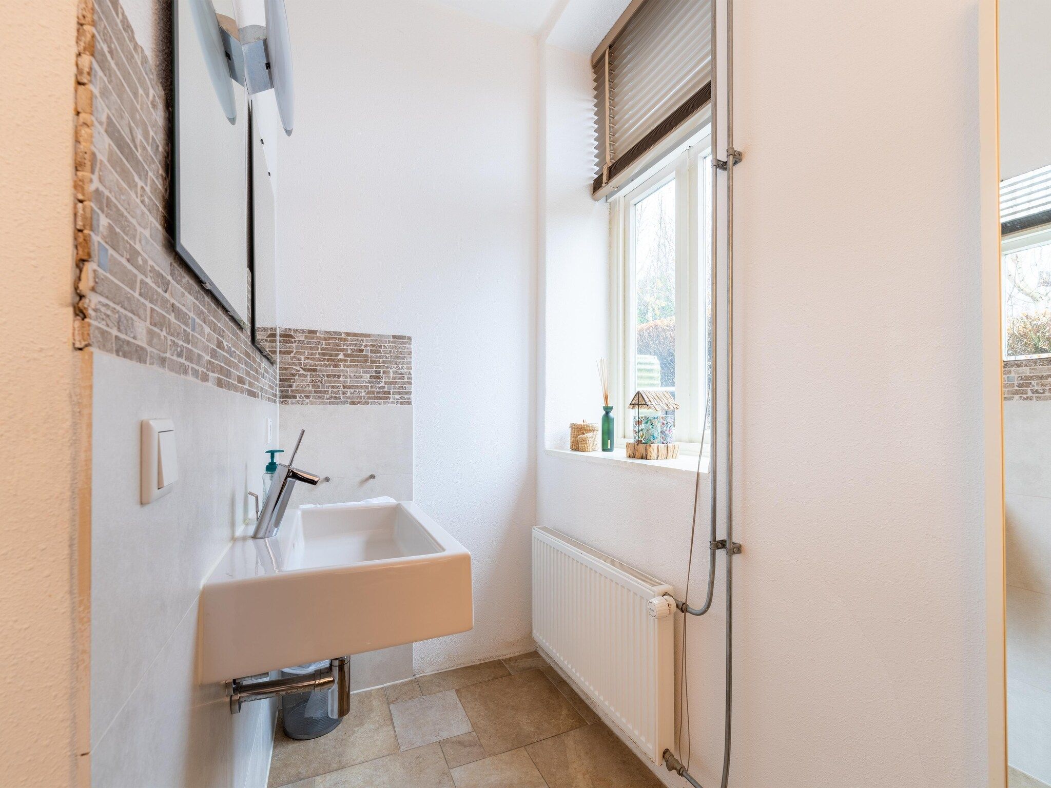 De badkamer van De Slaapfabriek in Teuge