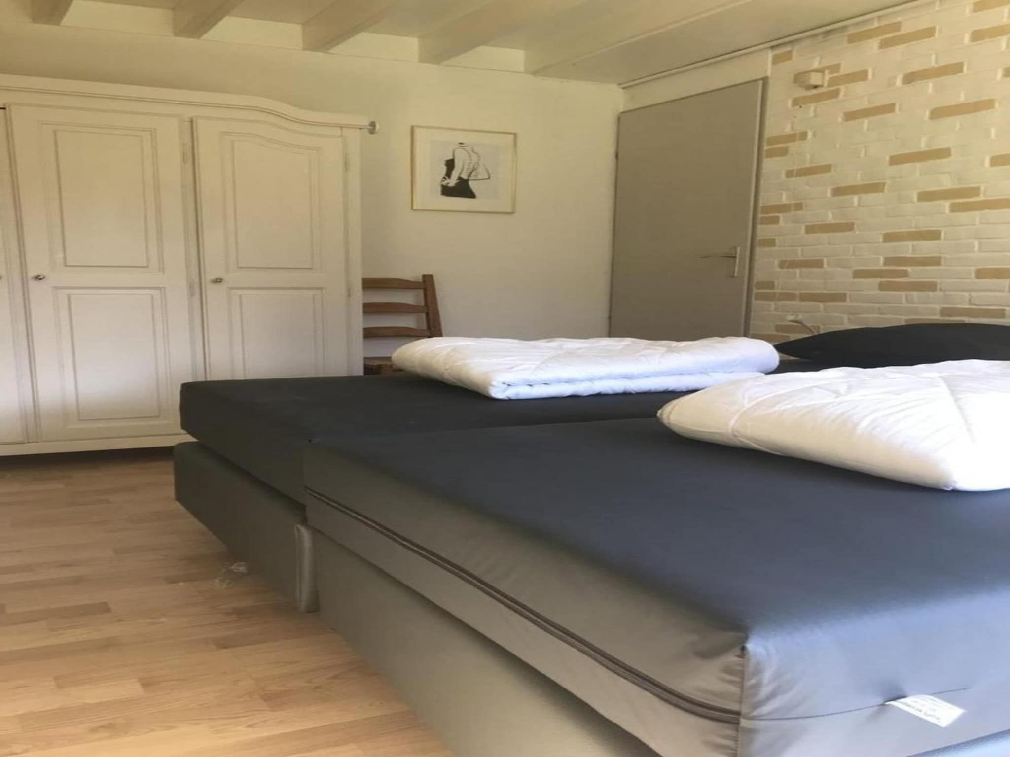 Een slaapkamer van Schoneveld 60 Zeester Breskens in Breskens