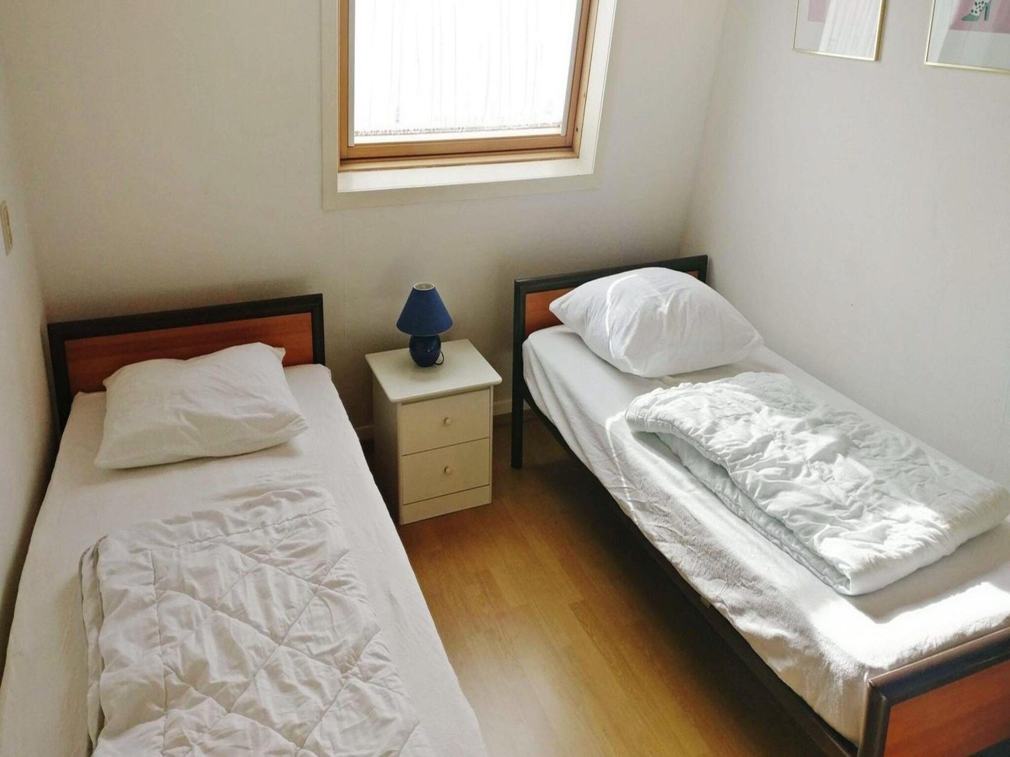 Een slaapkamer van Schoneveld 60 Zeester Breskens in Breskens