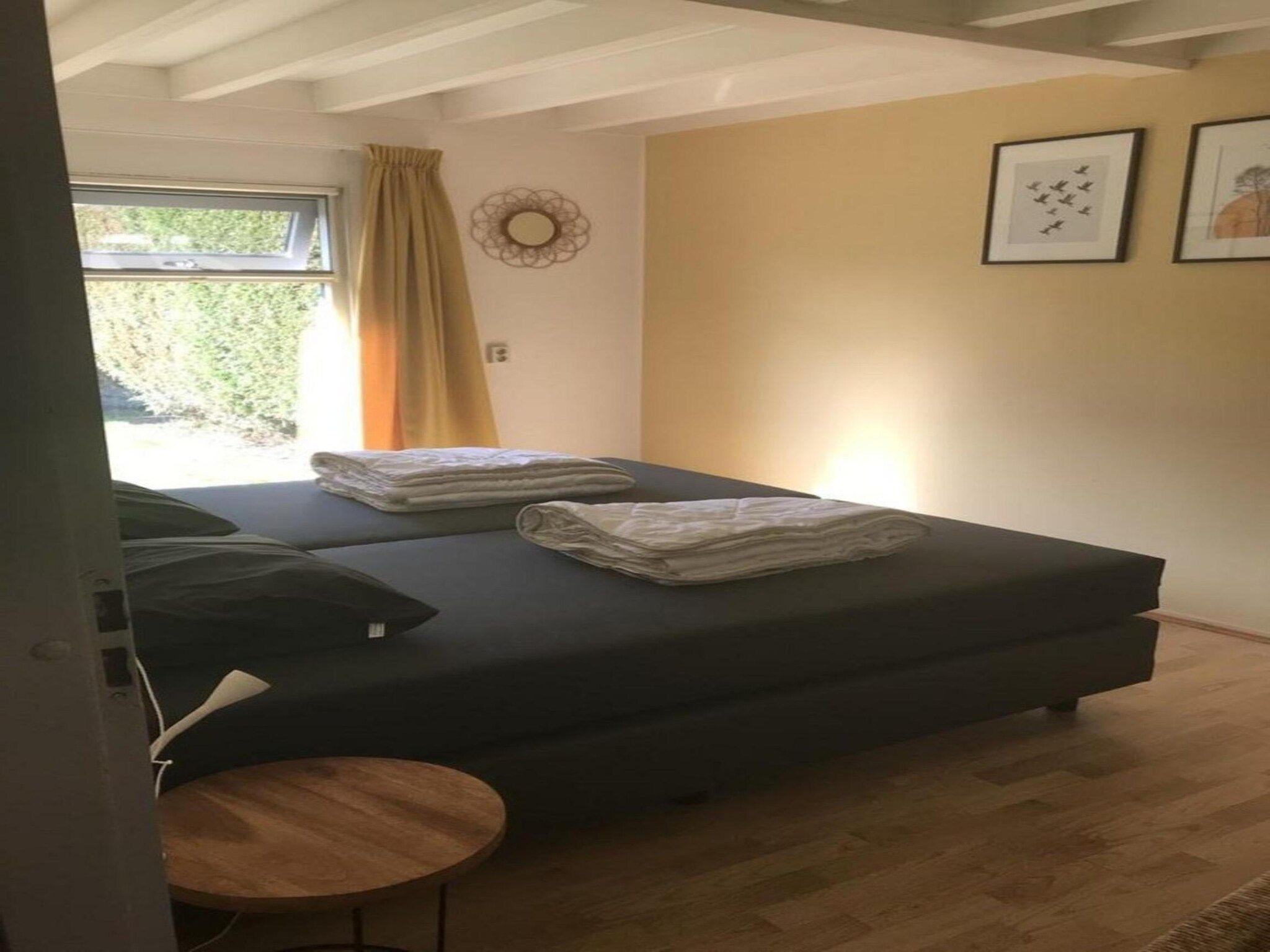 Een slaapkamer van Schoneveld 60 Zeester Breskens in Breskens