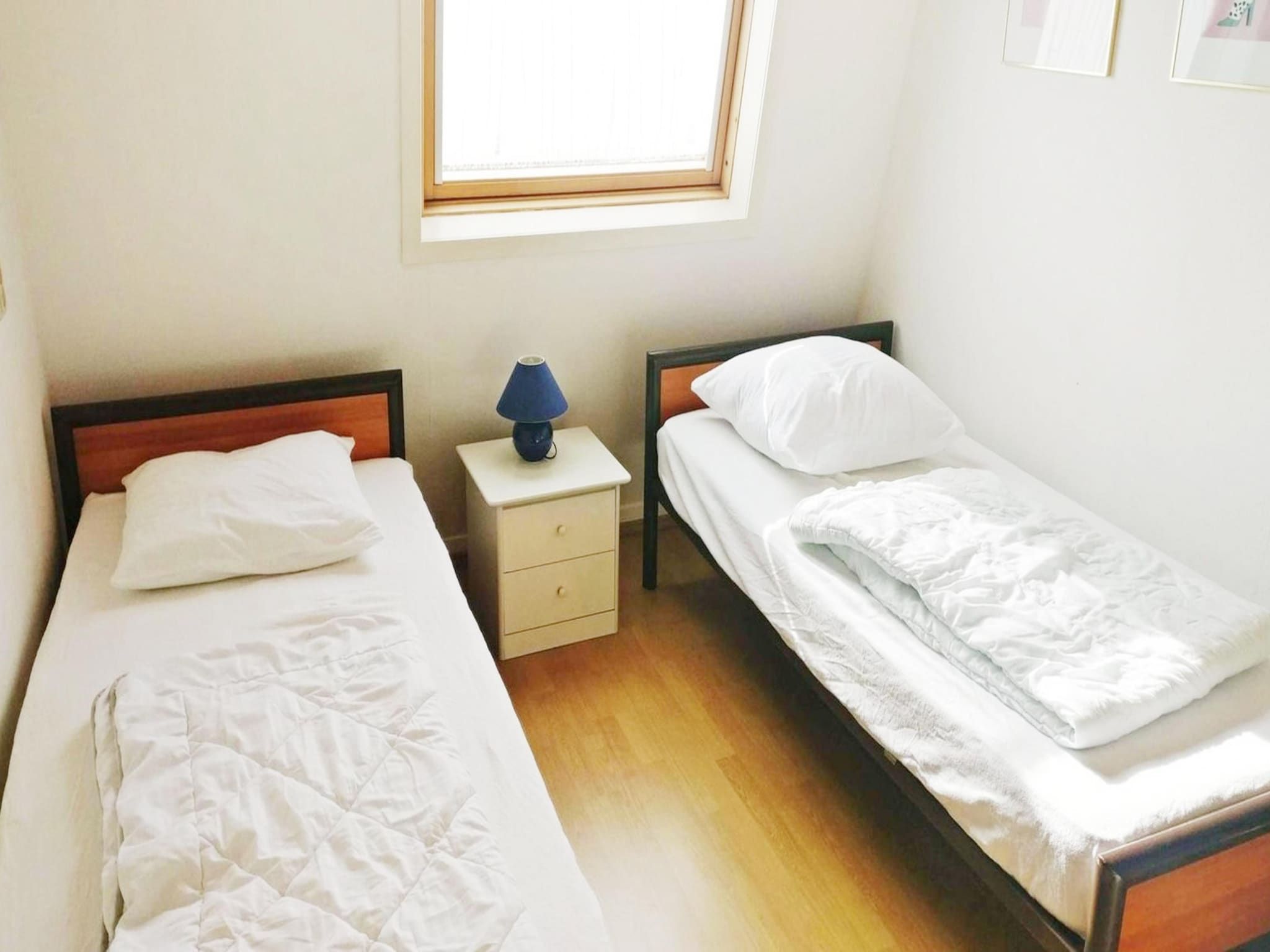 Een slaapkamer van Schoneveld 60 Zeester Breskens in Breskens