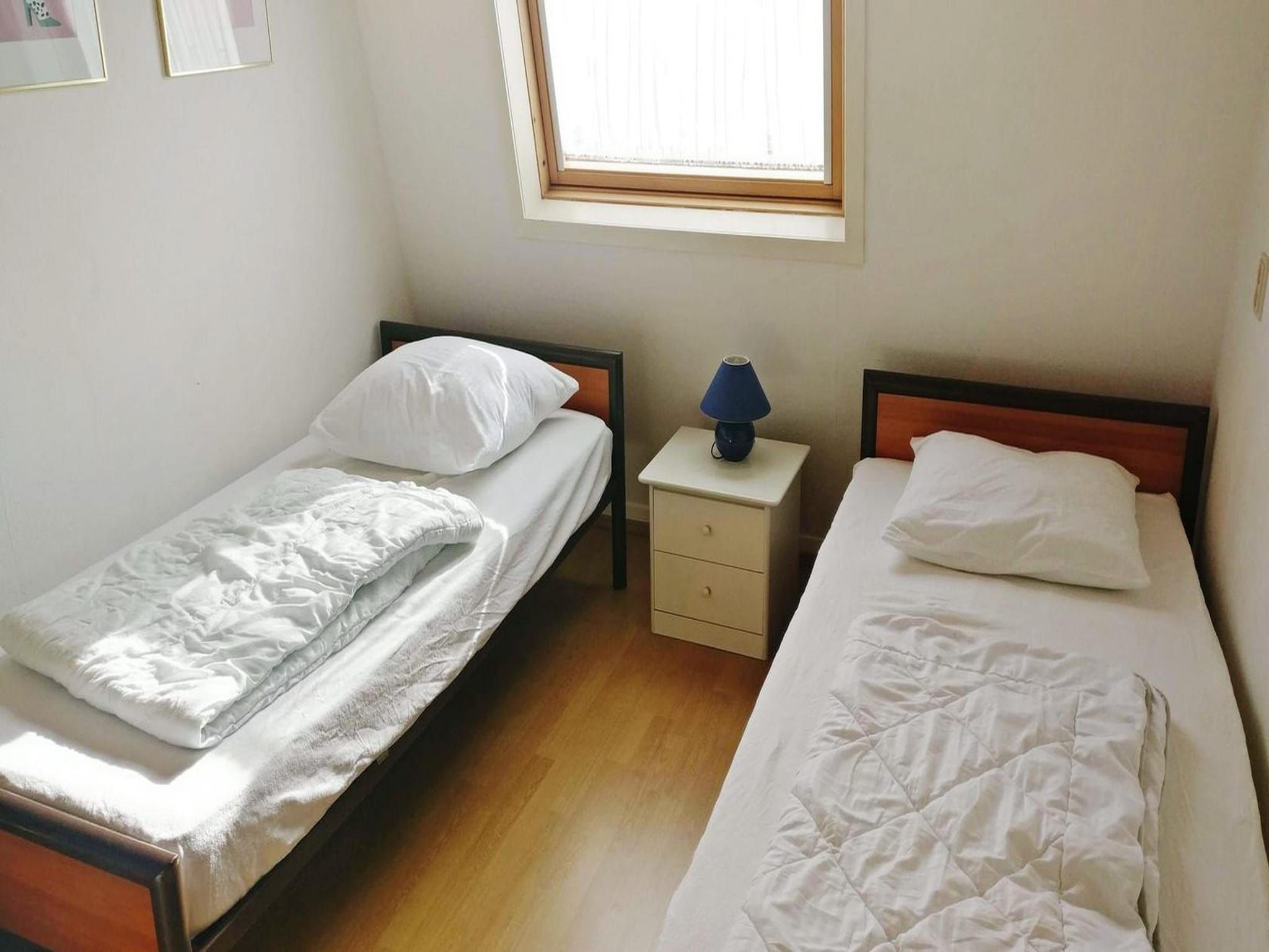 Een slaapkamer van Schoneveld 60 Zeester Breskens in Breskens