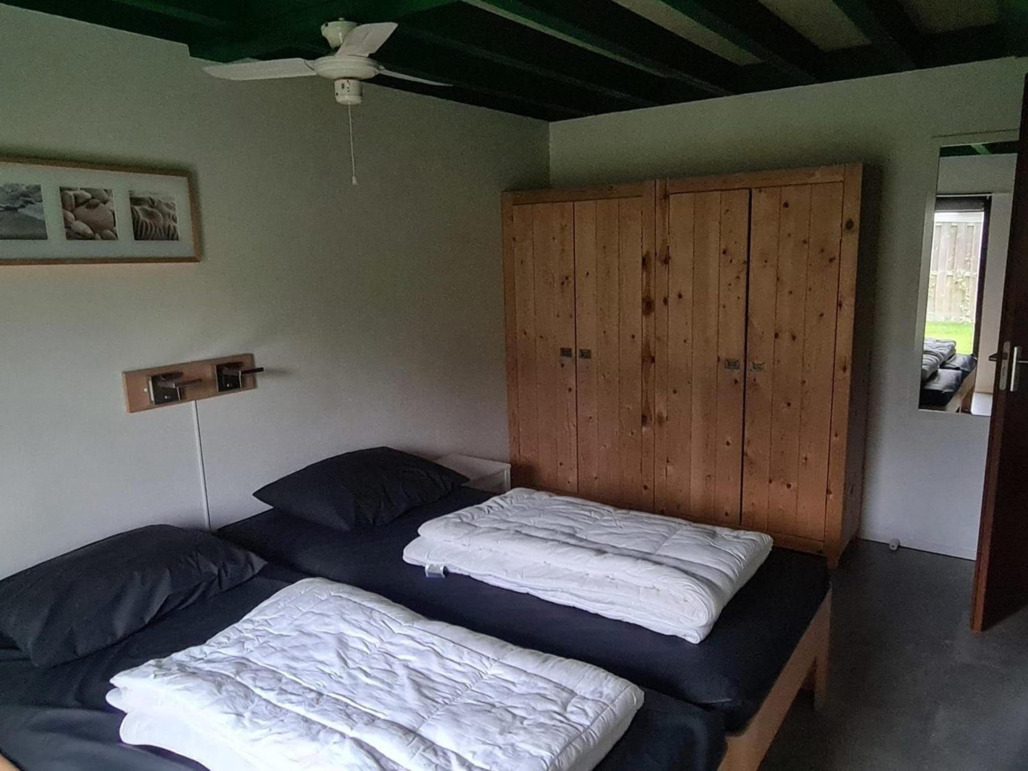 Een slaapkamer van Schoneveld 90 Zeester Breskens in Breskens