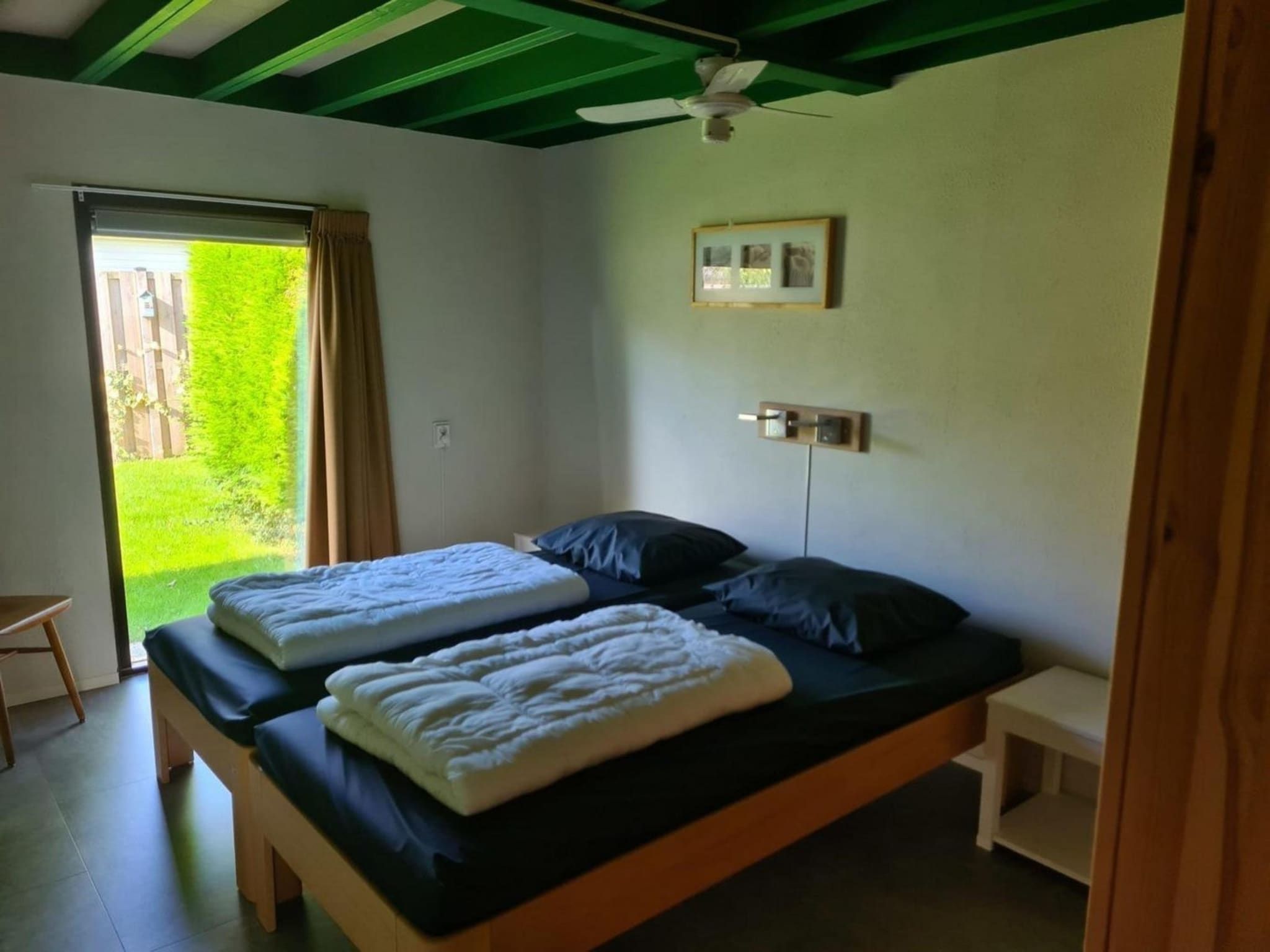 Een slaapkamer van Schoneveld 90 Zeester Breskens in Breskens