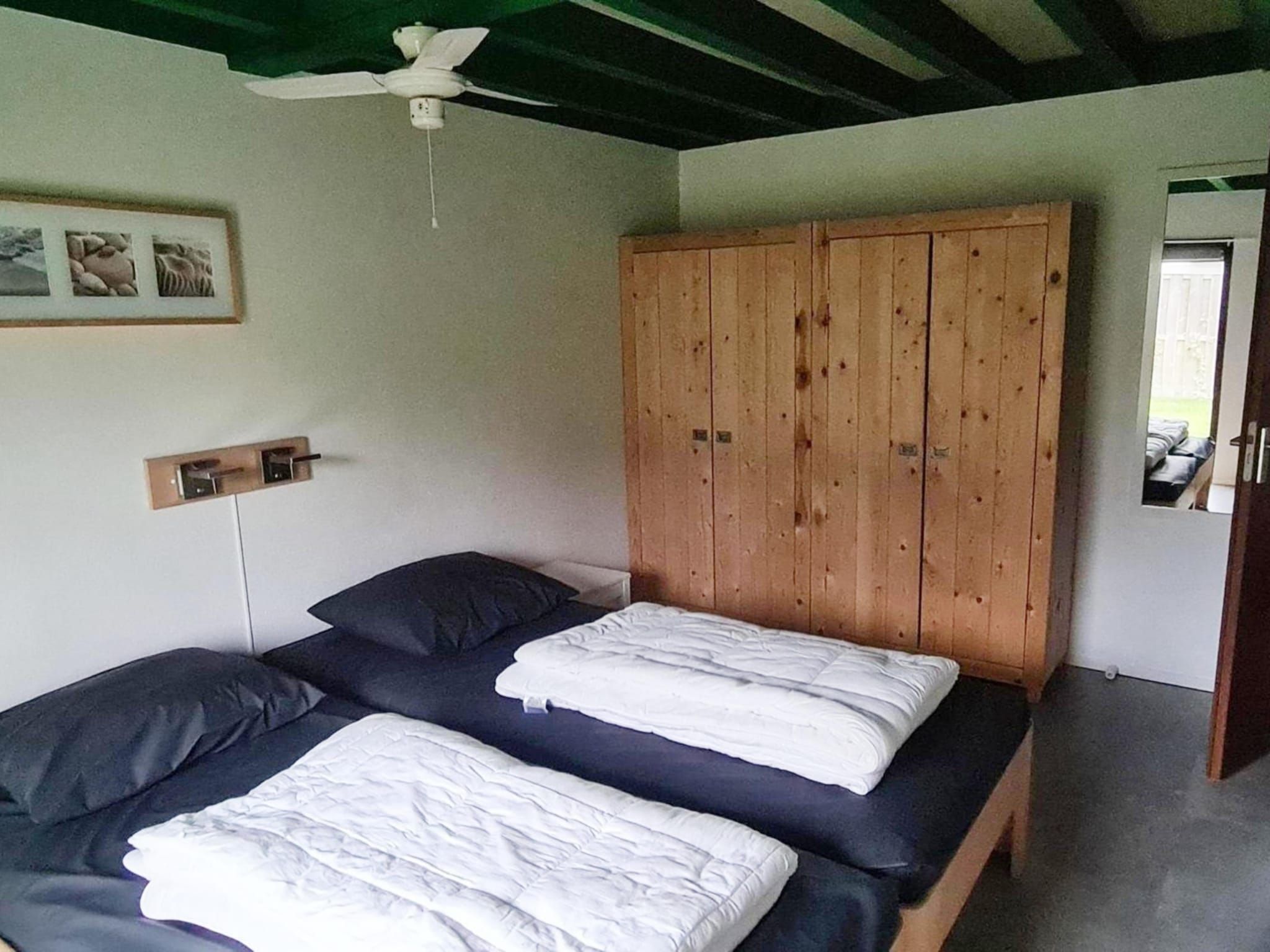 Een slaapkamer van Schoneveld 90 Zeester Breskens in Breskens