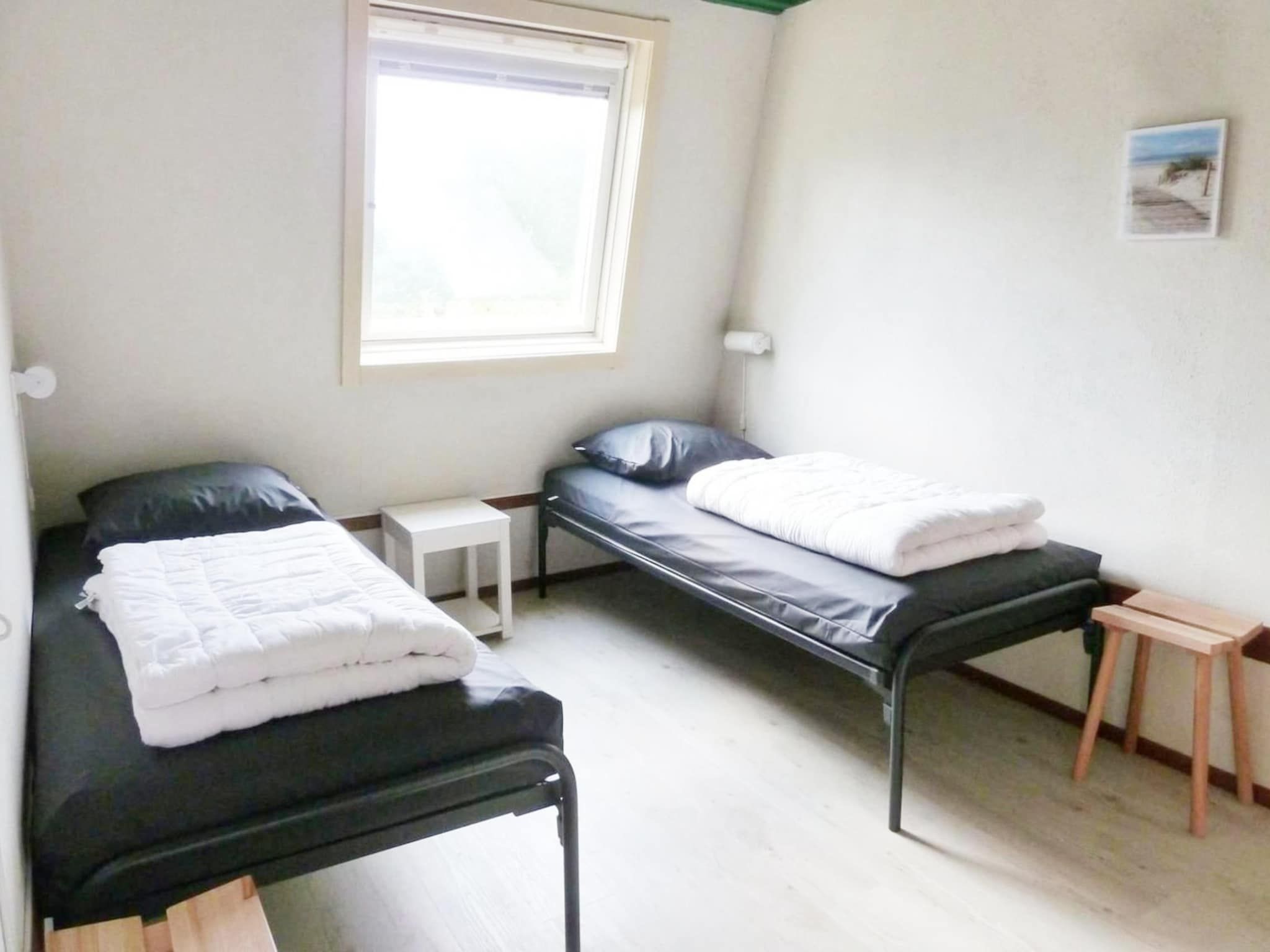Een slaapkamer van Schoneveld 90 Zeester Breskens in Breskens