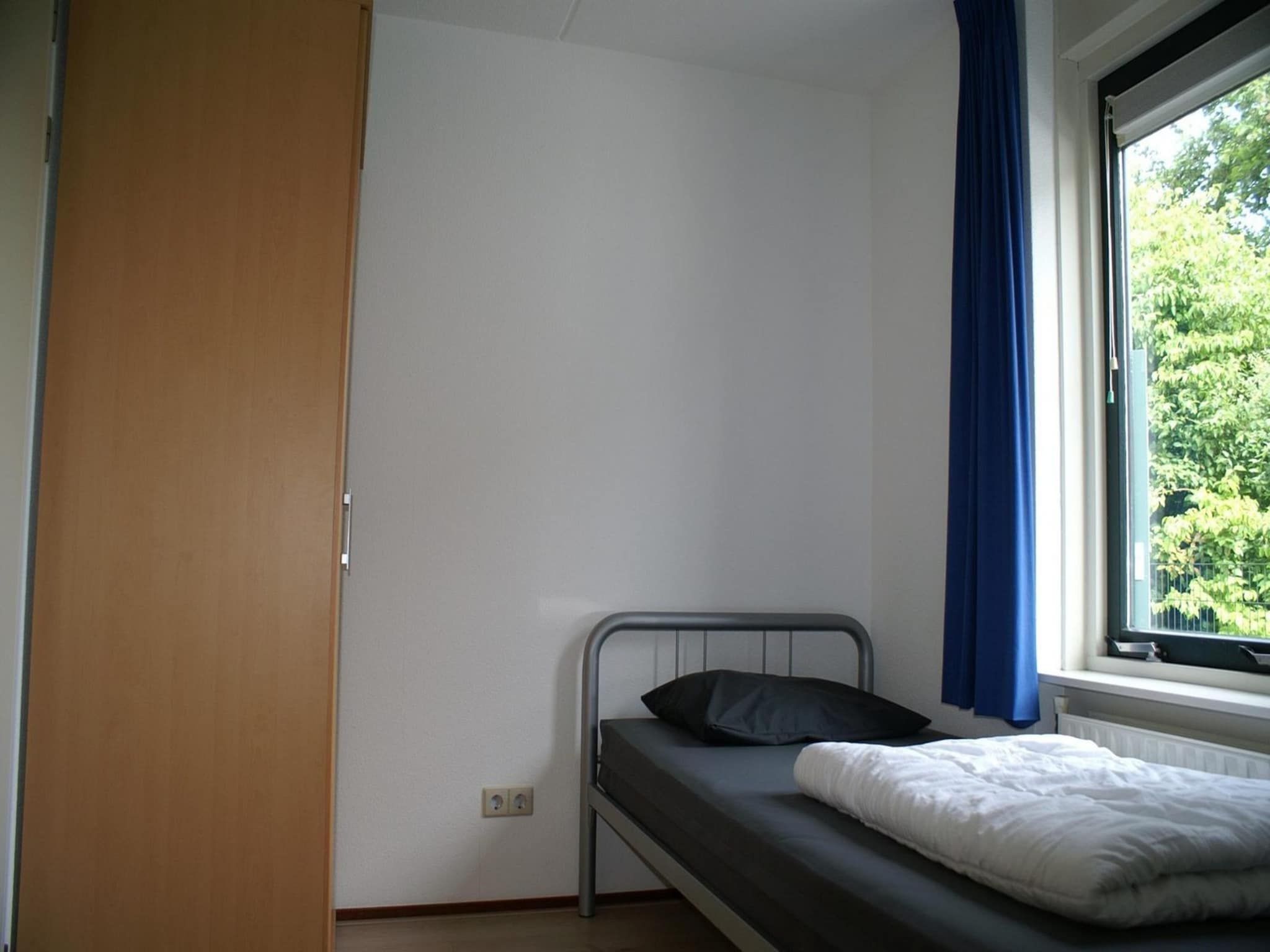 Een slaapkamer van Schoneveld 327 Stern Breskens in Breskens