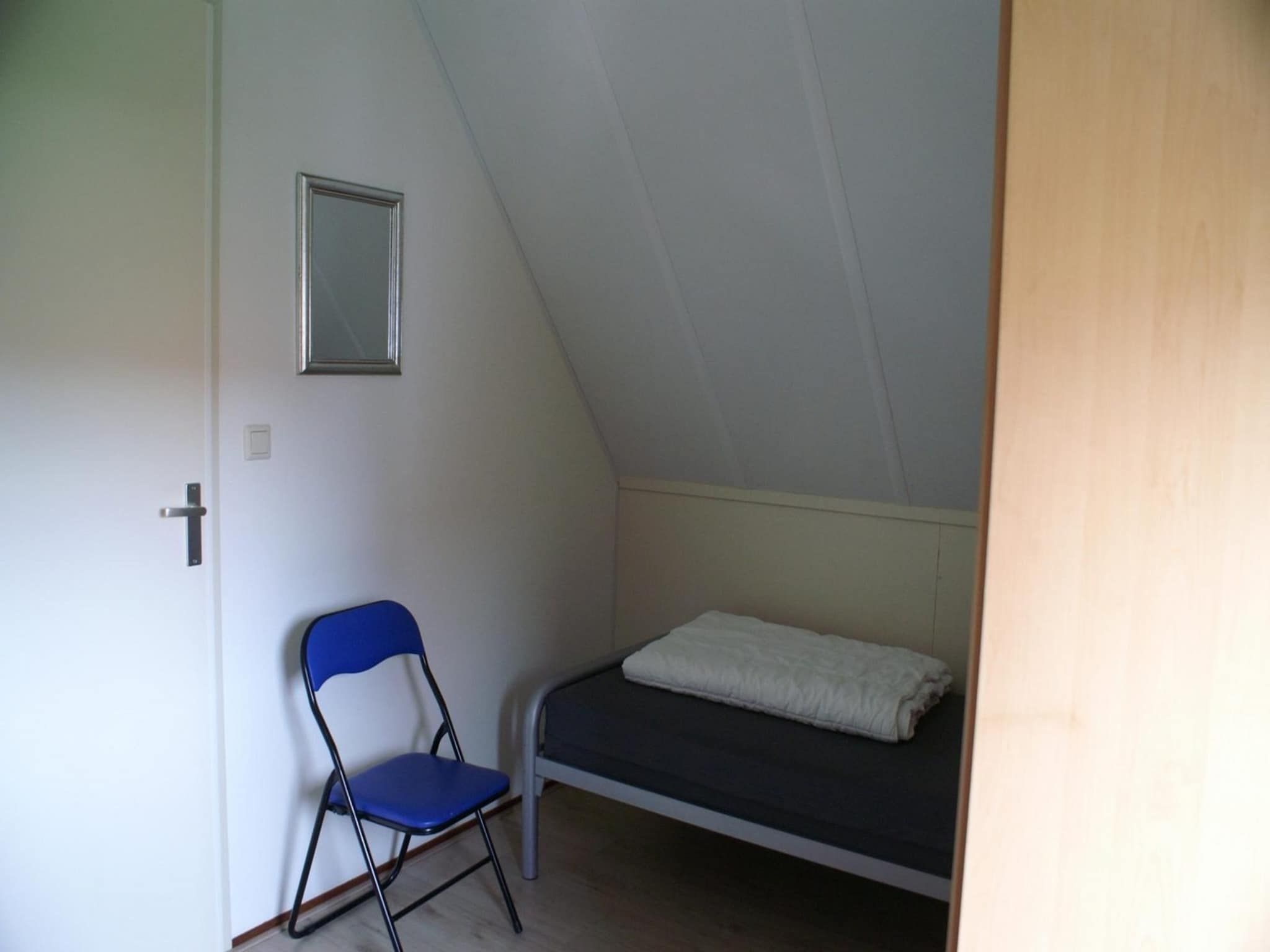 Een slaapkamer van Schoneveld 327 Stern Breskens in Breskens