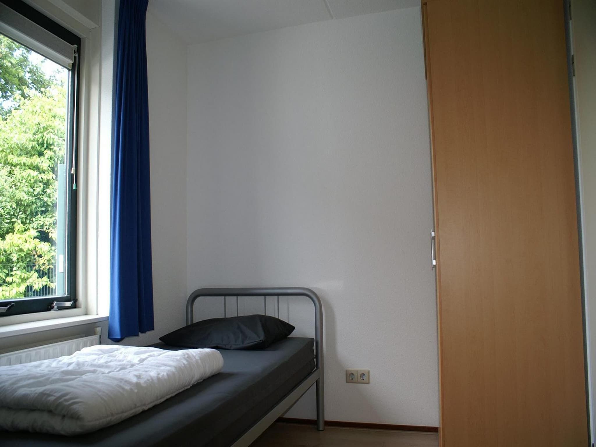 Een slaapkamer van Schoneveld 327 Stern Breskens in Breskens