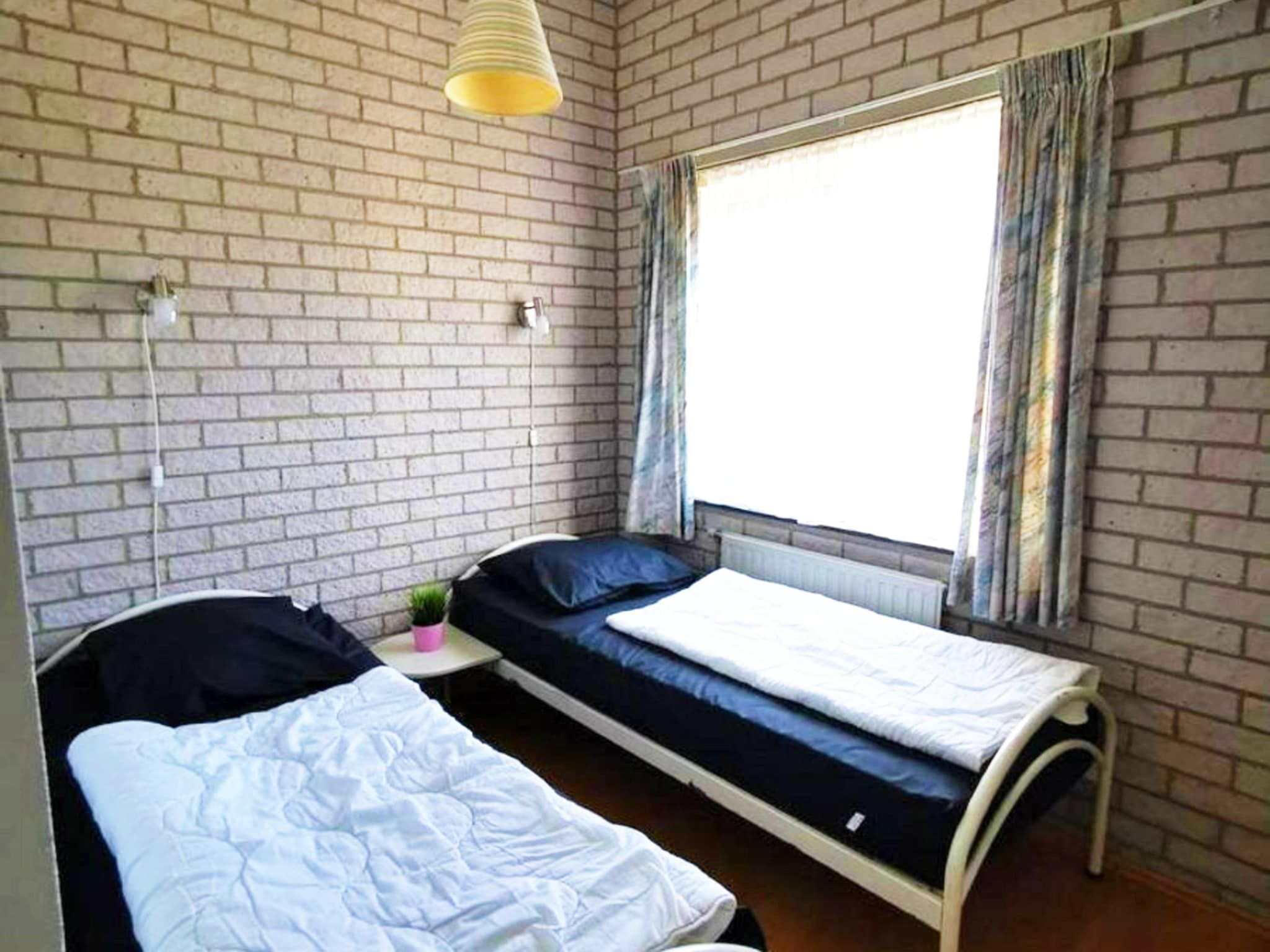 Een slaapkamer van Schoneveld 353 Strandparel Breskens in Breskens