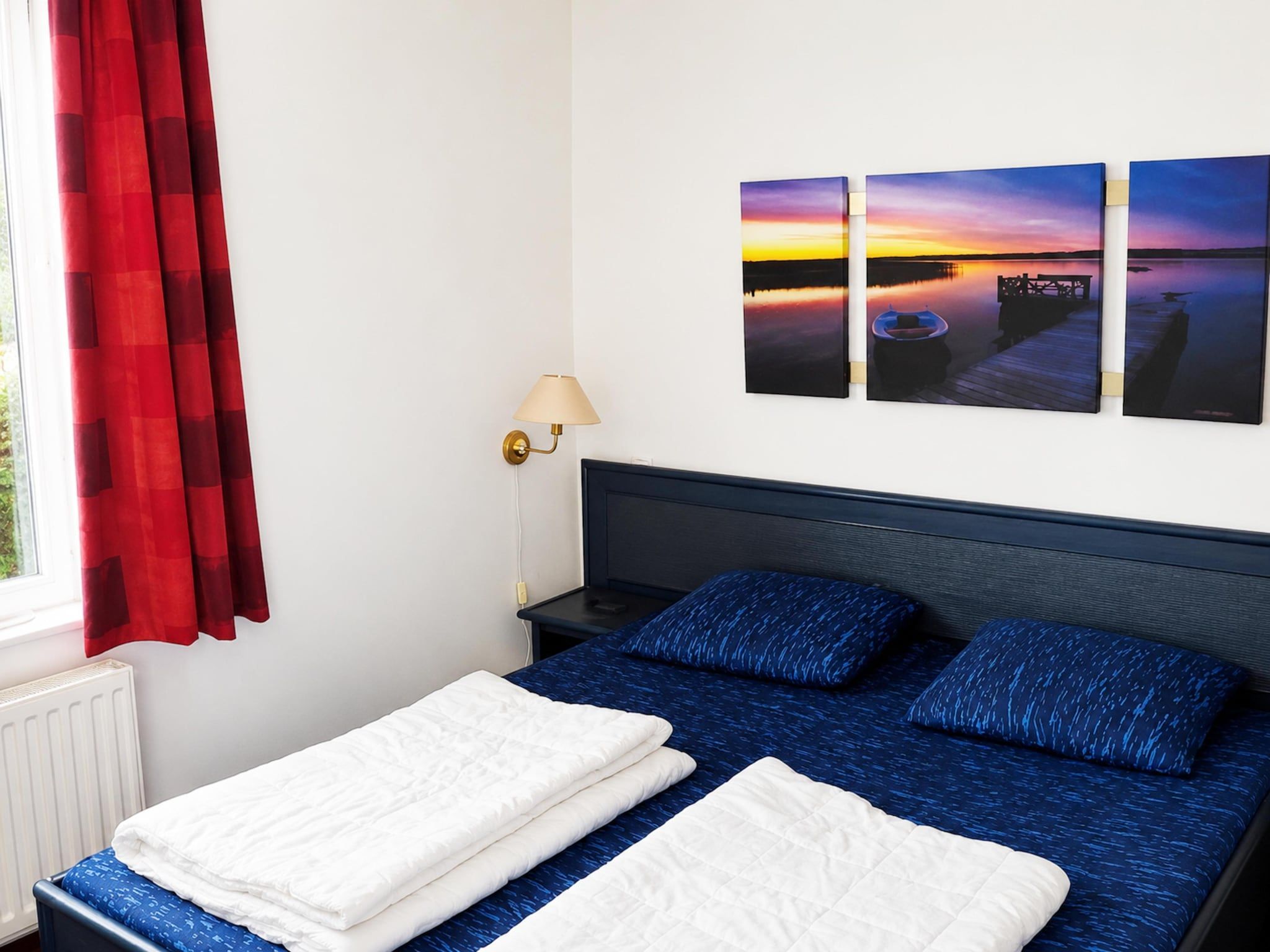 Een slaapkamer van Schoneveld 132 Zeemeeuw Breskens in Breskens