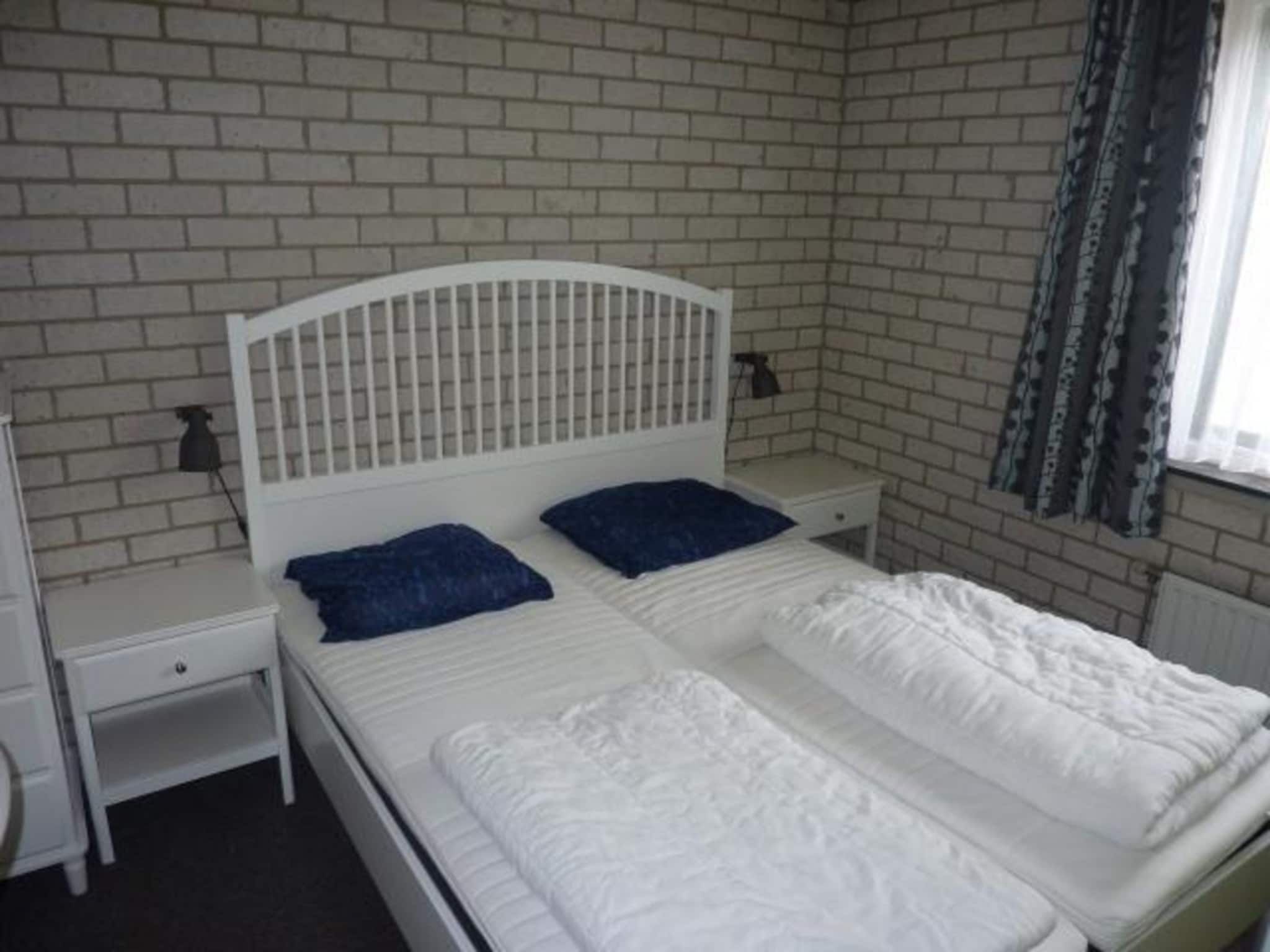 Een slaapkamer van Schoneveld 367 Strandparel Breskens in Breskens