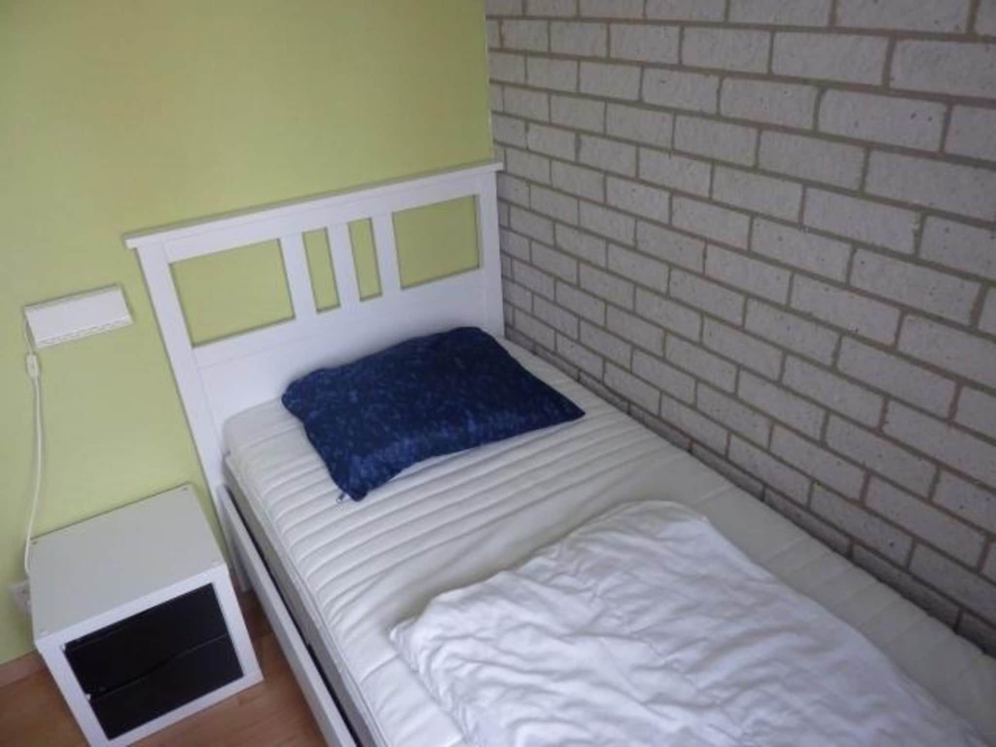 Een slaapkamer van Schoneveld 367 Strandparel Breskens in Breskens