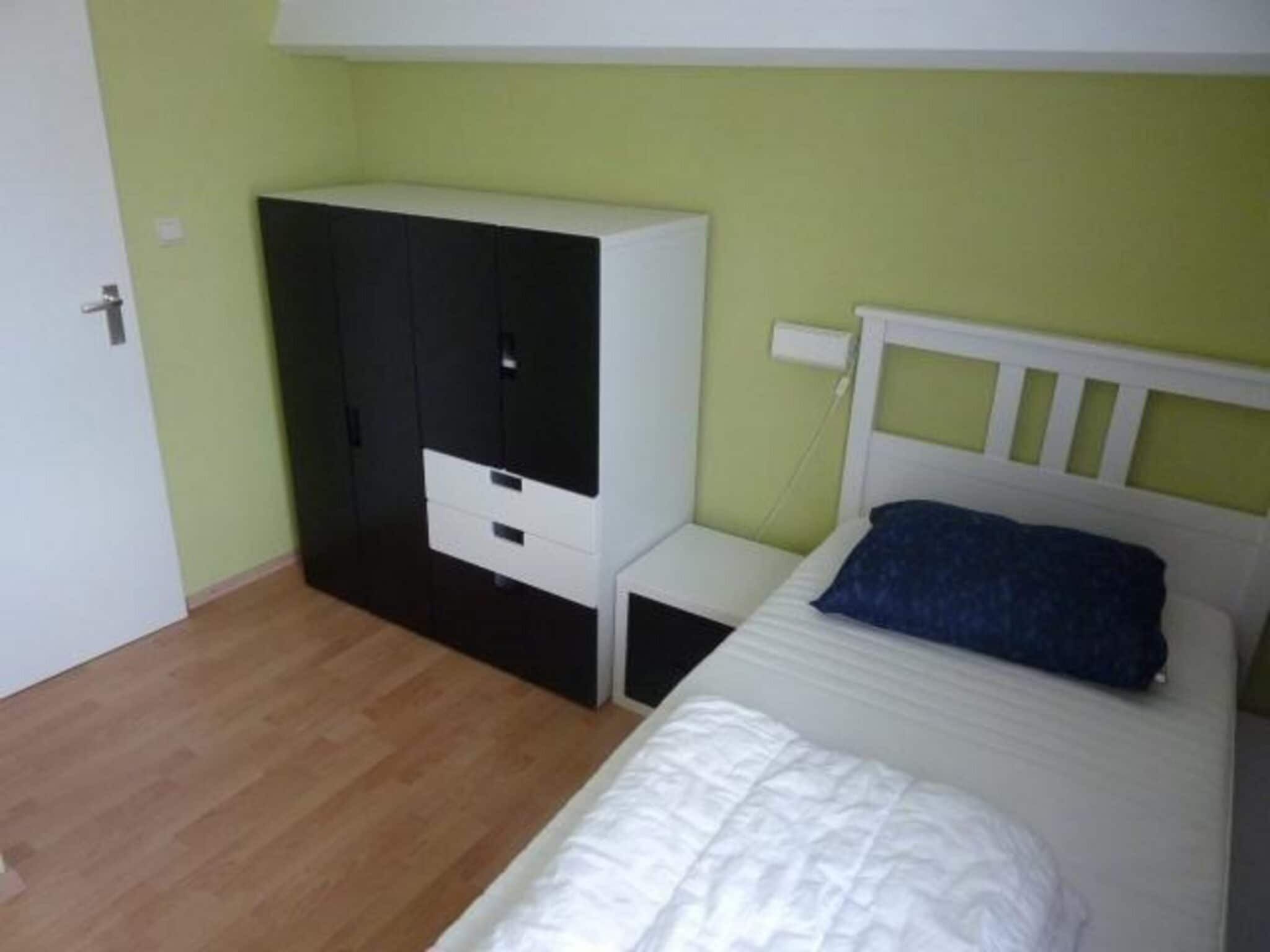 Een slaapkamer van Schoneveld 367 Strandparel Breskens in Breskens