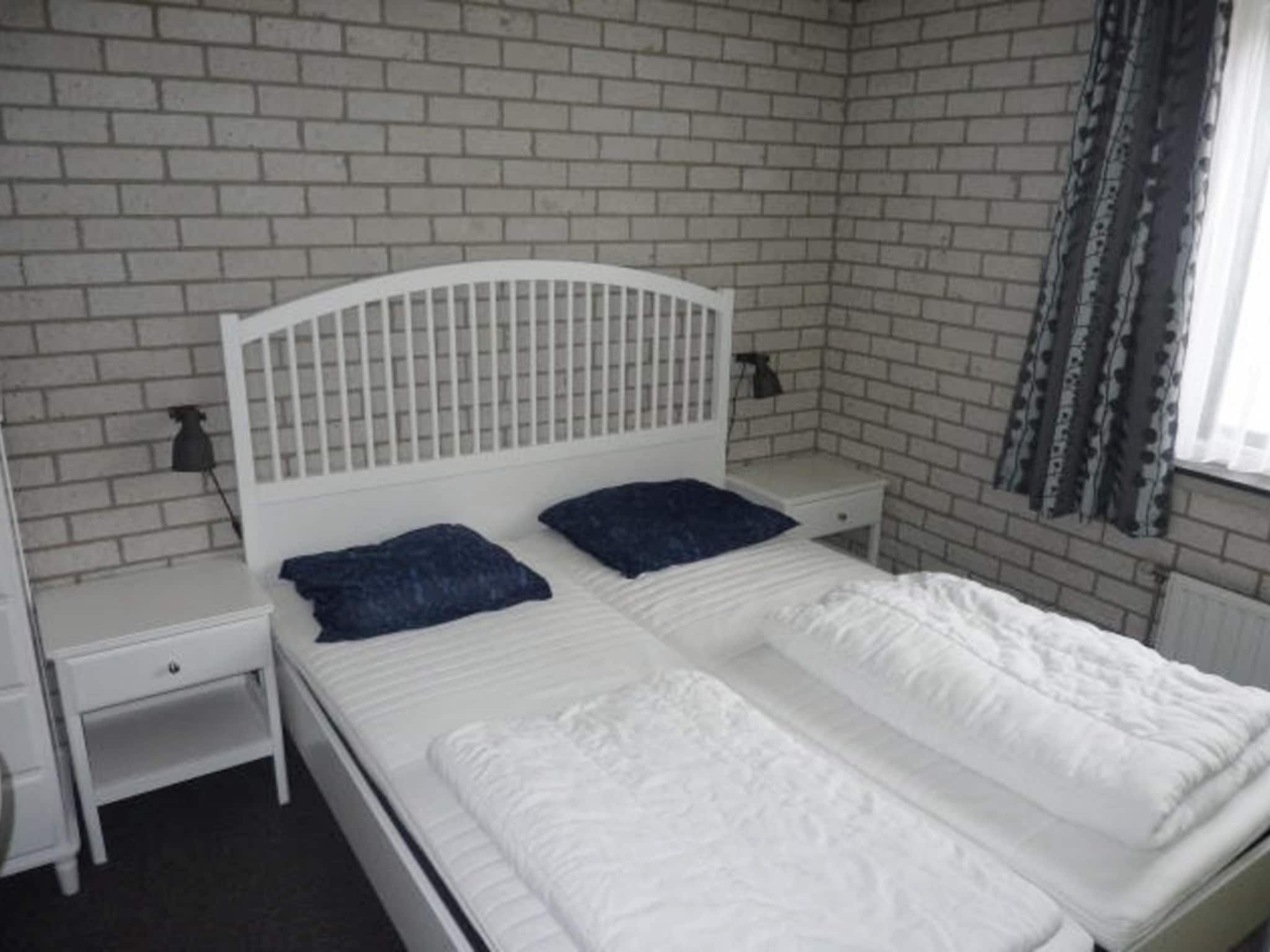 Een slaapkamer van Schoneveld 367 Strandparel Breskens in Breskens