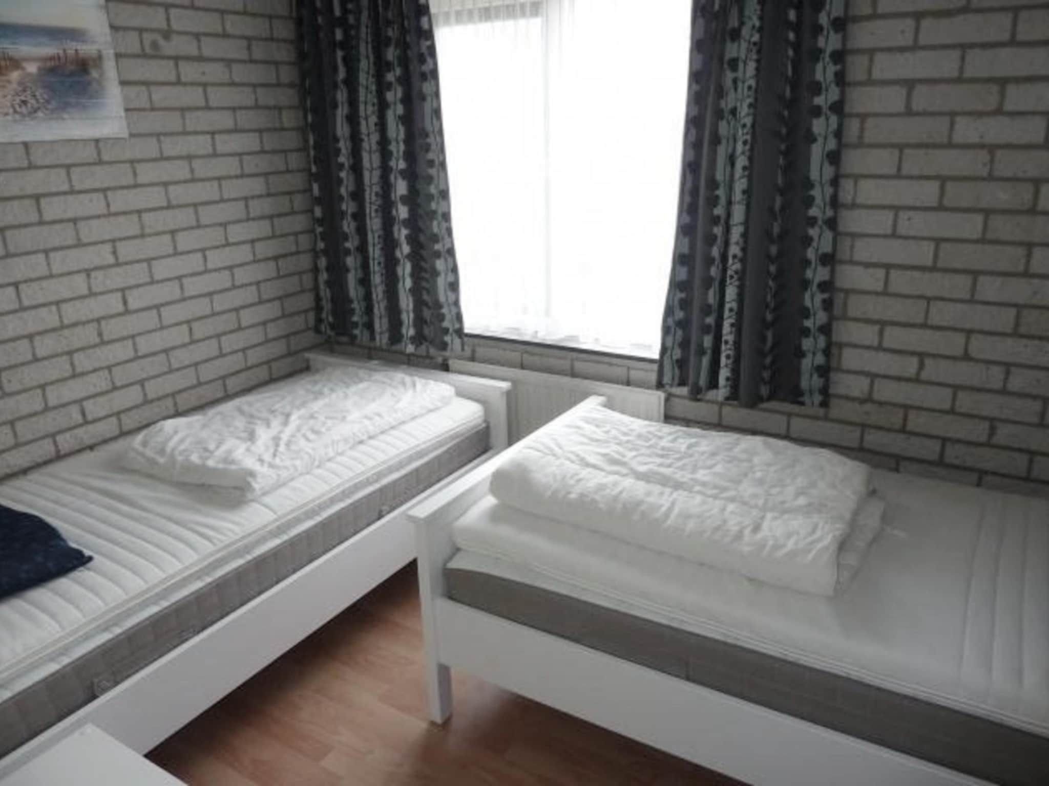 Een slaapkamer van Schoneveld 367 Strandparel Breskens in Breskens