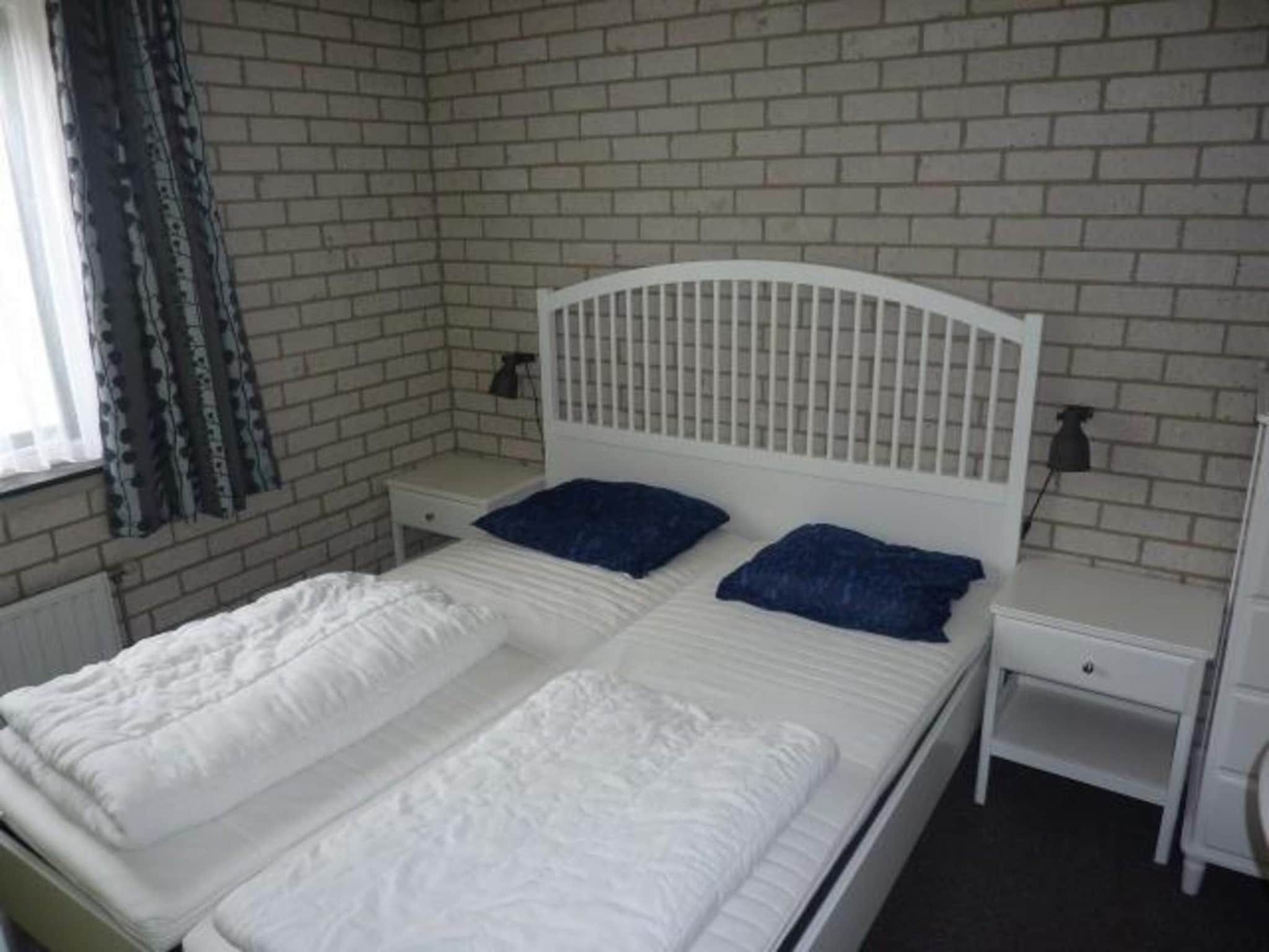 Een slaapkamer van Schoneveld 367 Strandparel Breskens in Breskens