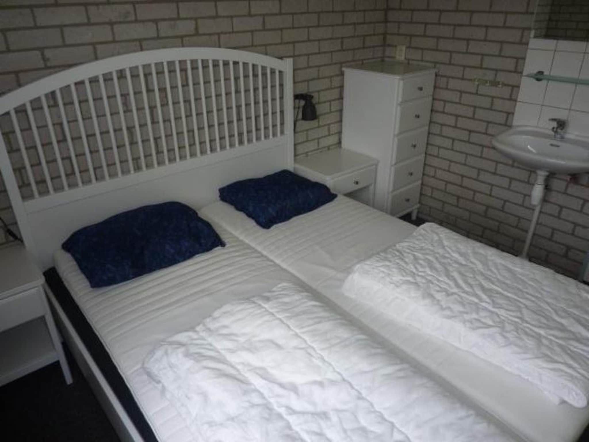 Een slaapkamer van Schoneveld 367 Strandparel Breskens in Breskens